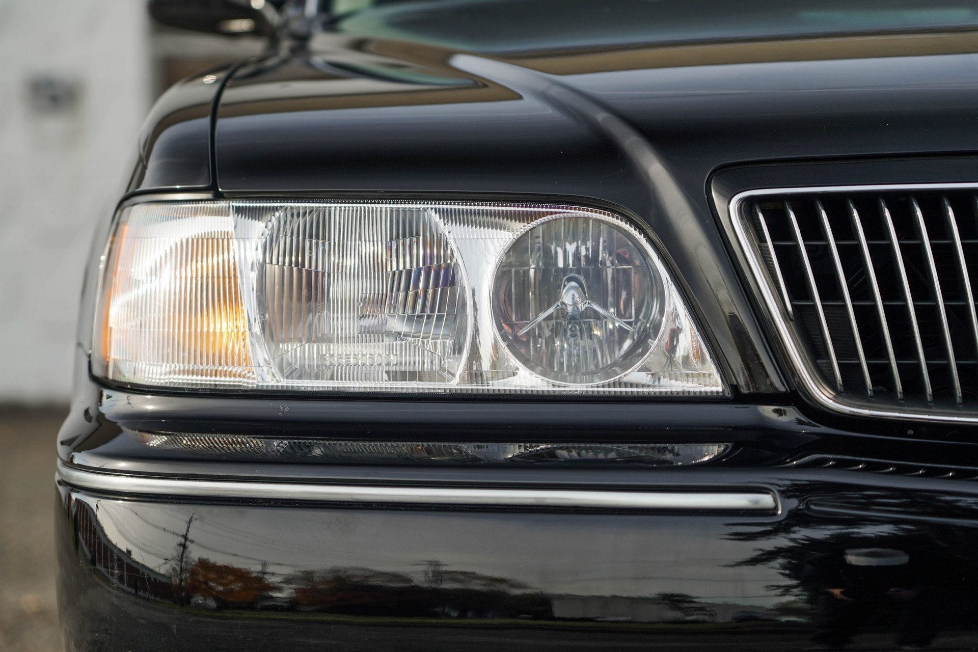 This 17k Mile Infiniti Q45 From 2000 Comes Complete With A Motorola Flip Phone