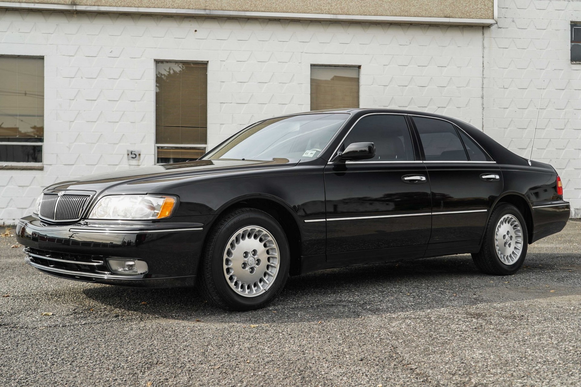 This 17k Mile Infiniti Q45 From 2000 Comes Complete With A Motorola Flip Phone