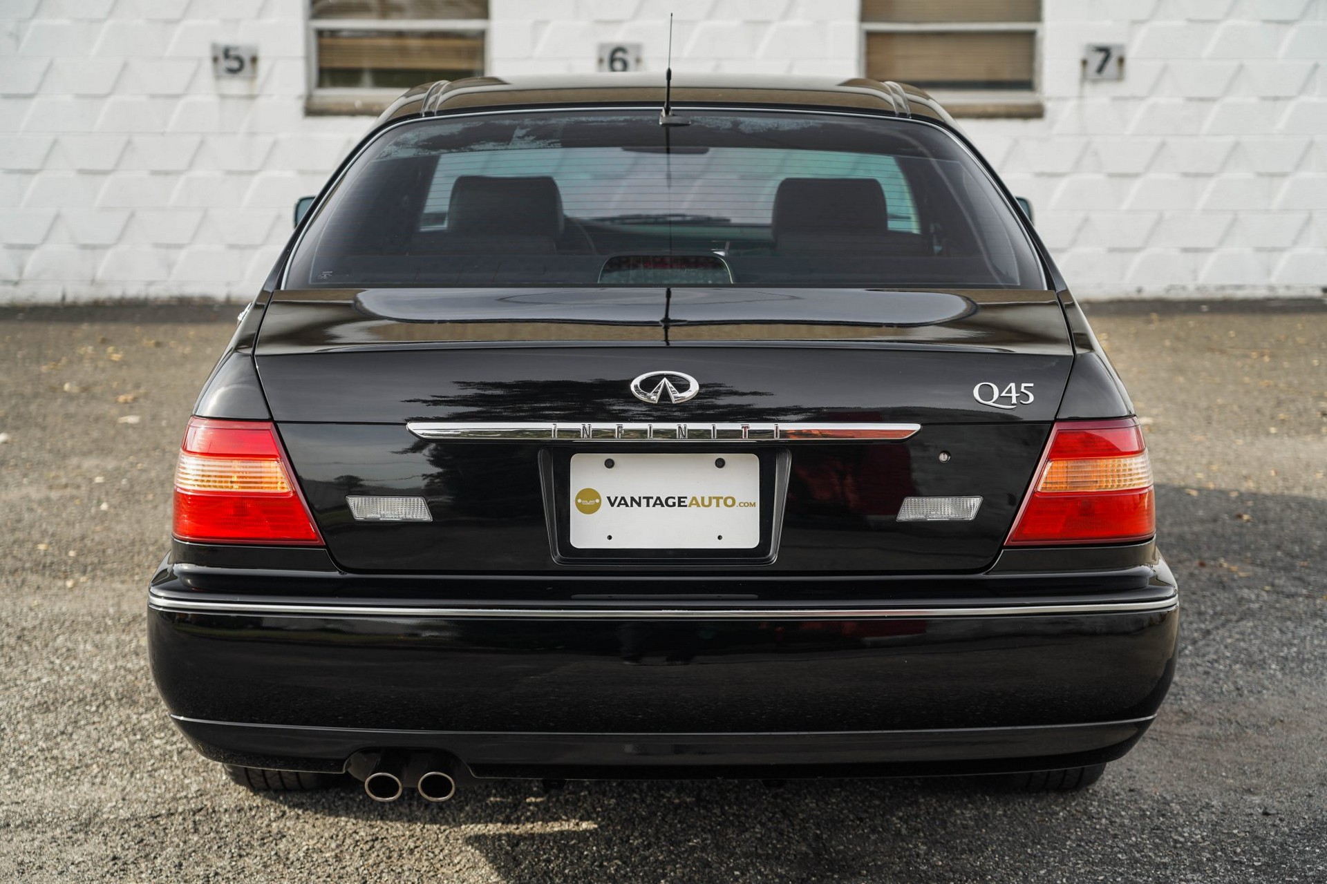 This 17k Mile Infiniti Q45 From 2000 Comes Complete With A Motorola Flip Phone