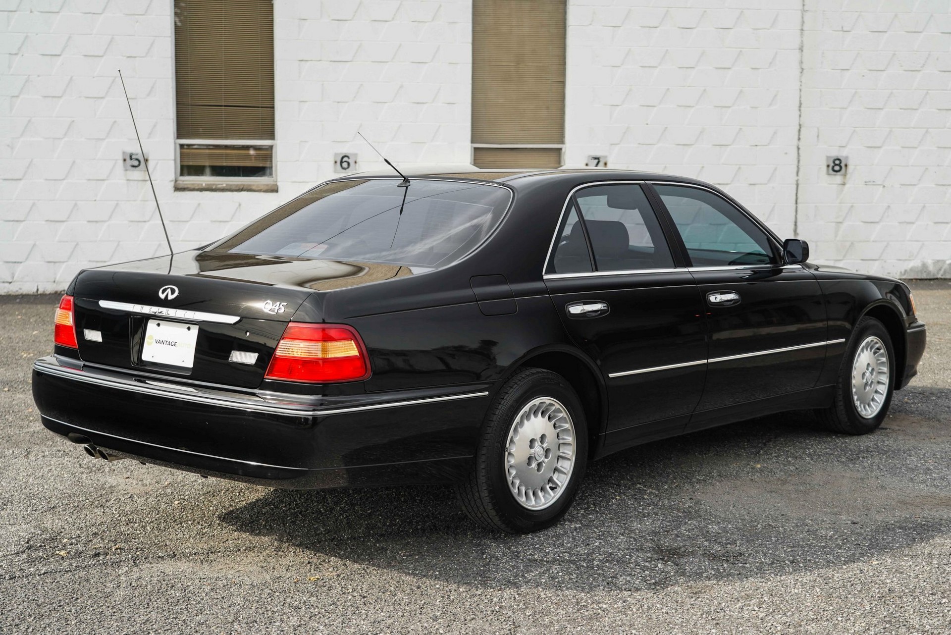 This 17k Mile Infiniti Q45 From 2000 Comes Complete With A Motorola Flip Phone