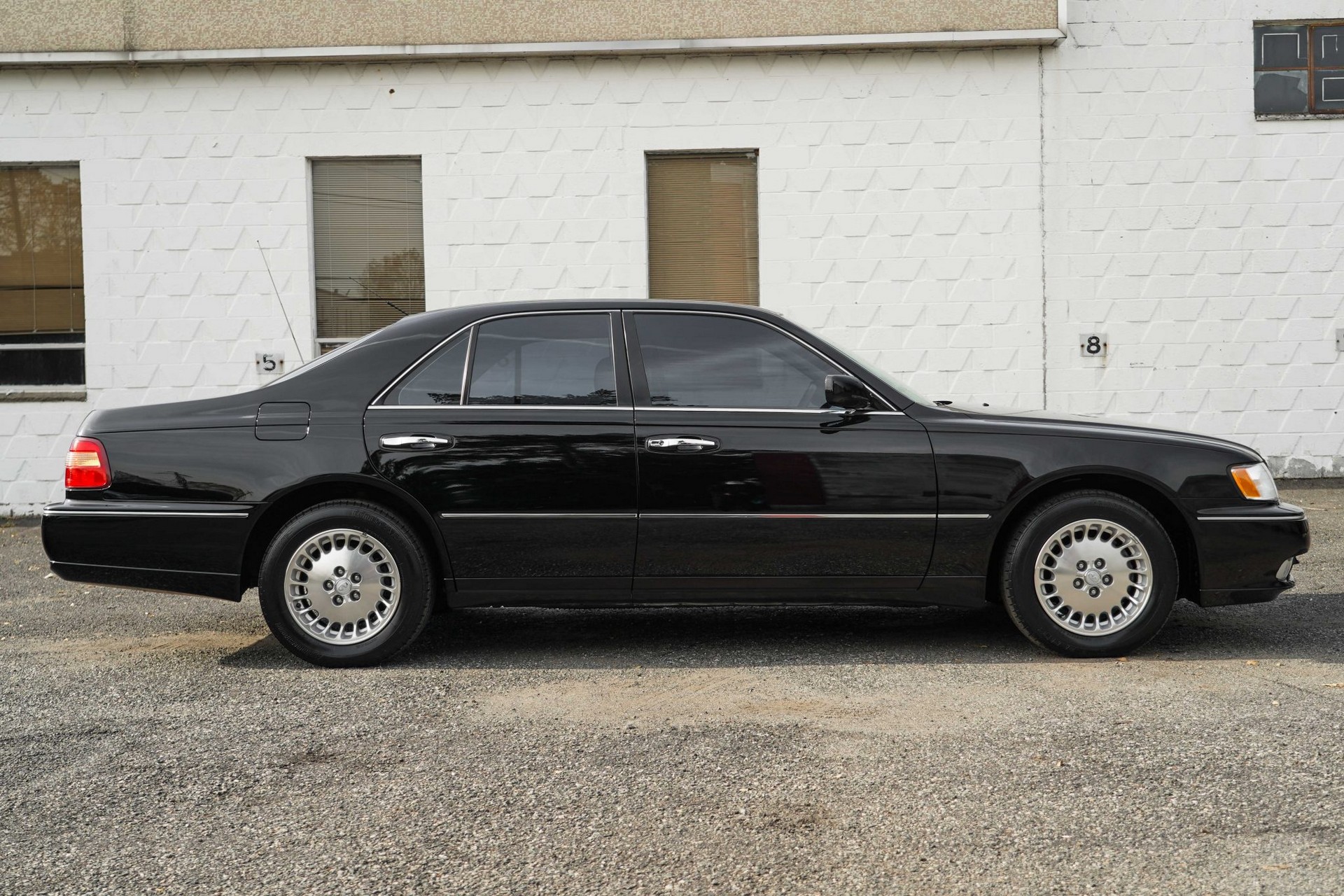 This 17k Mile Infiniti Q45 From 2000 Comes Complete With A Motorola Flip Phone