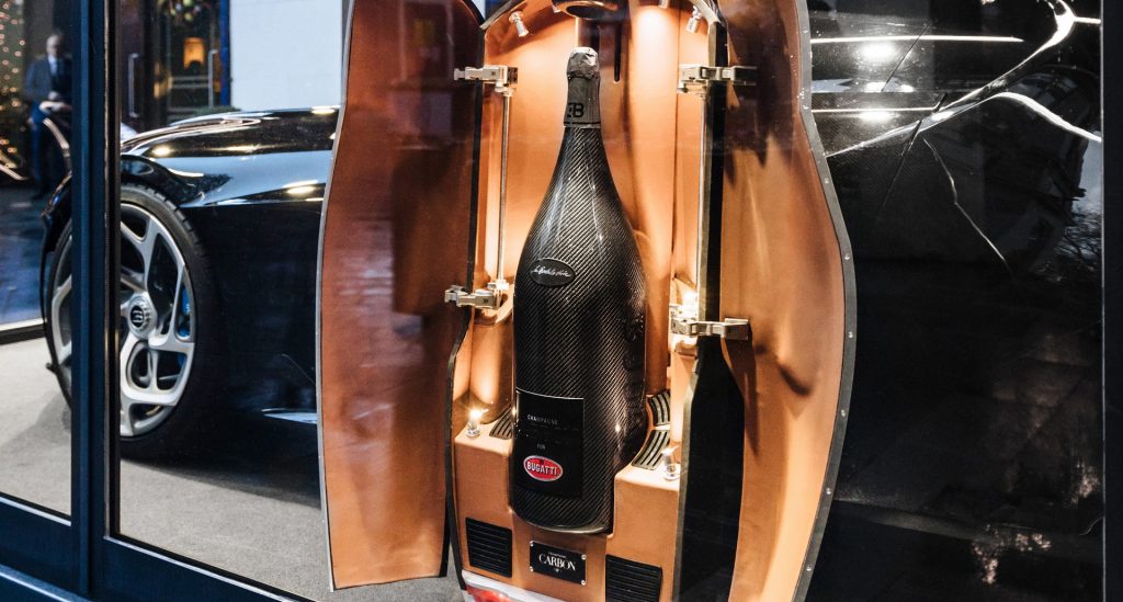  The Sale Of Bugatti’s Carbon Fiber Champagne Bottle Was As Wild And Bougie As You’d Expect