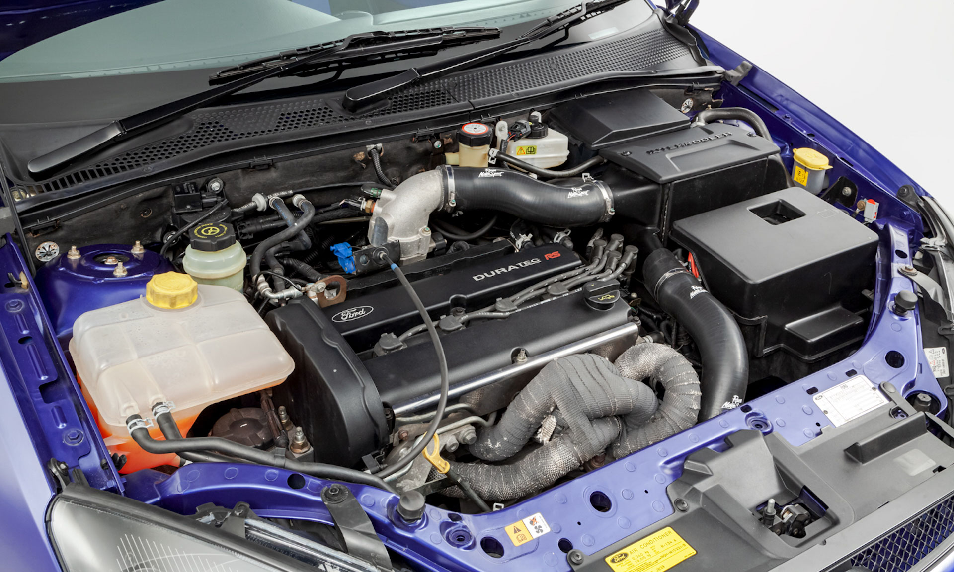 The Ford Focus RS On The Left Costs $25k/£19k More. Is It Worth It?