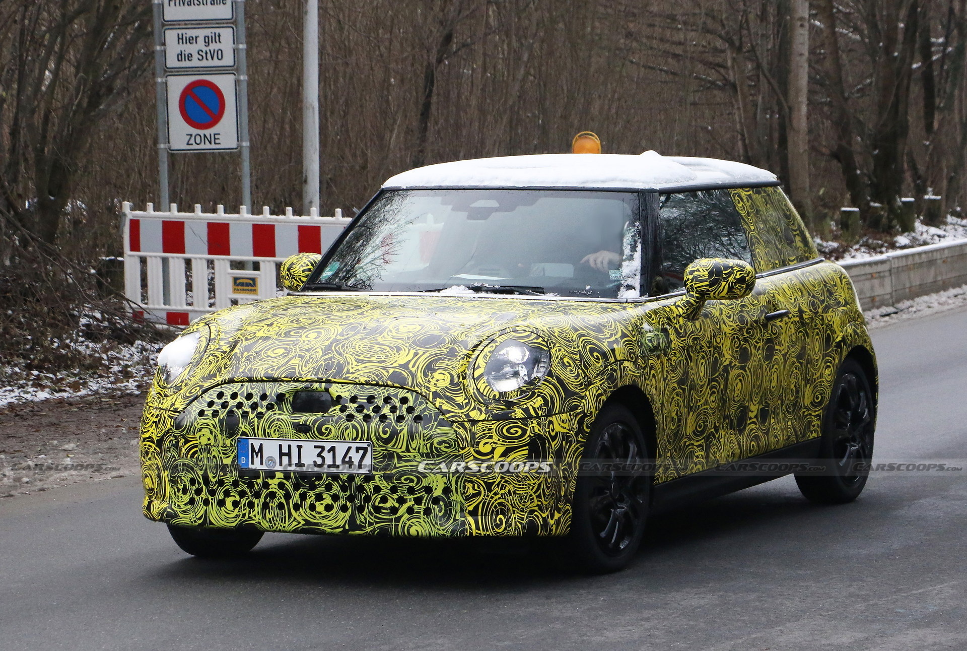 What Is MINI Testing Under The Body Of Current Hatch?