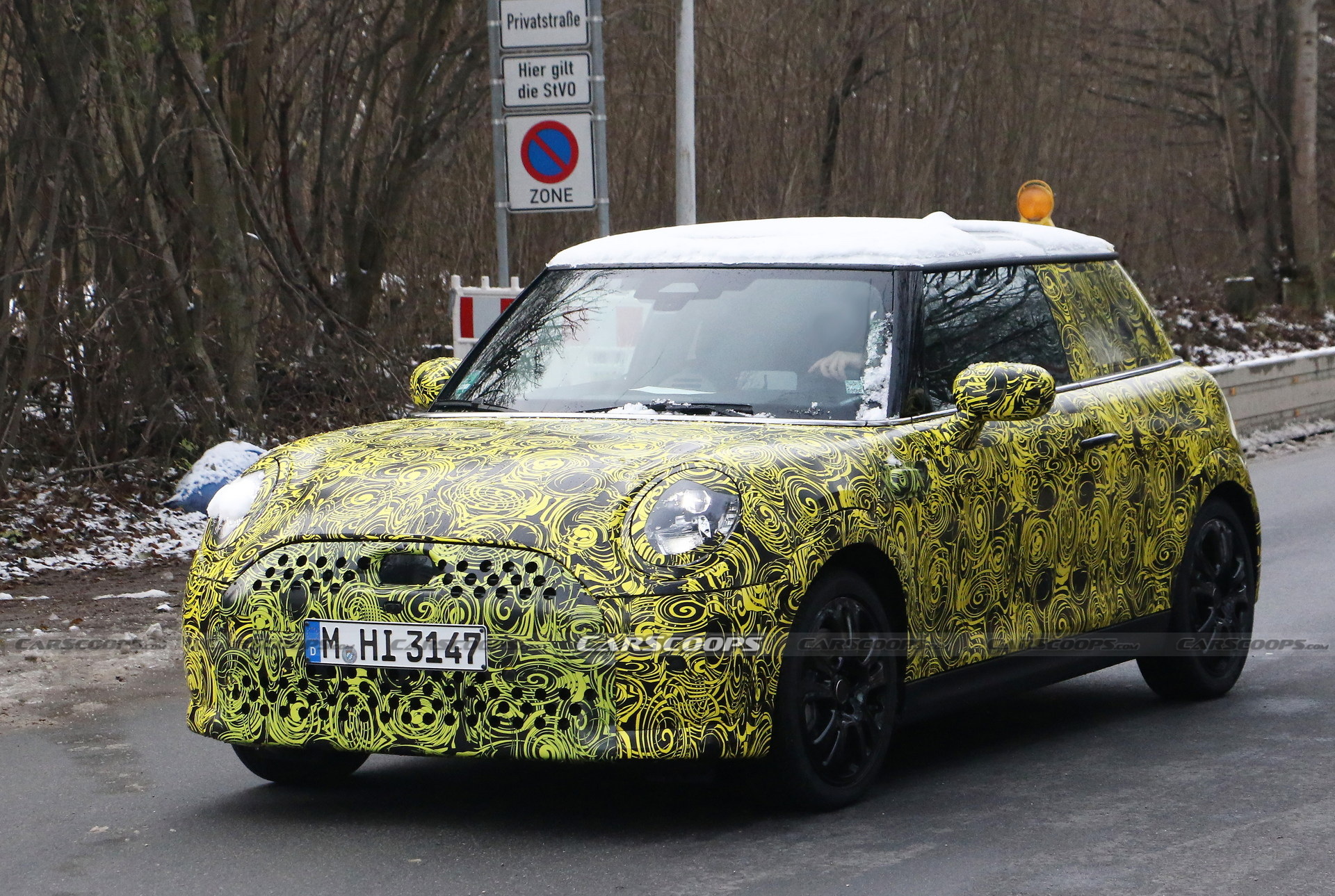 What Is MINI Testing Under The Body Of Current Hatch?