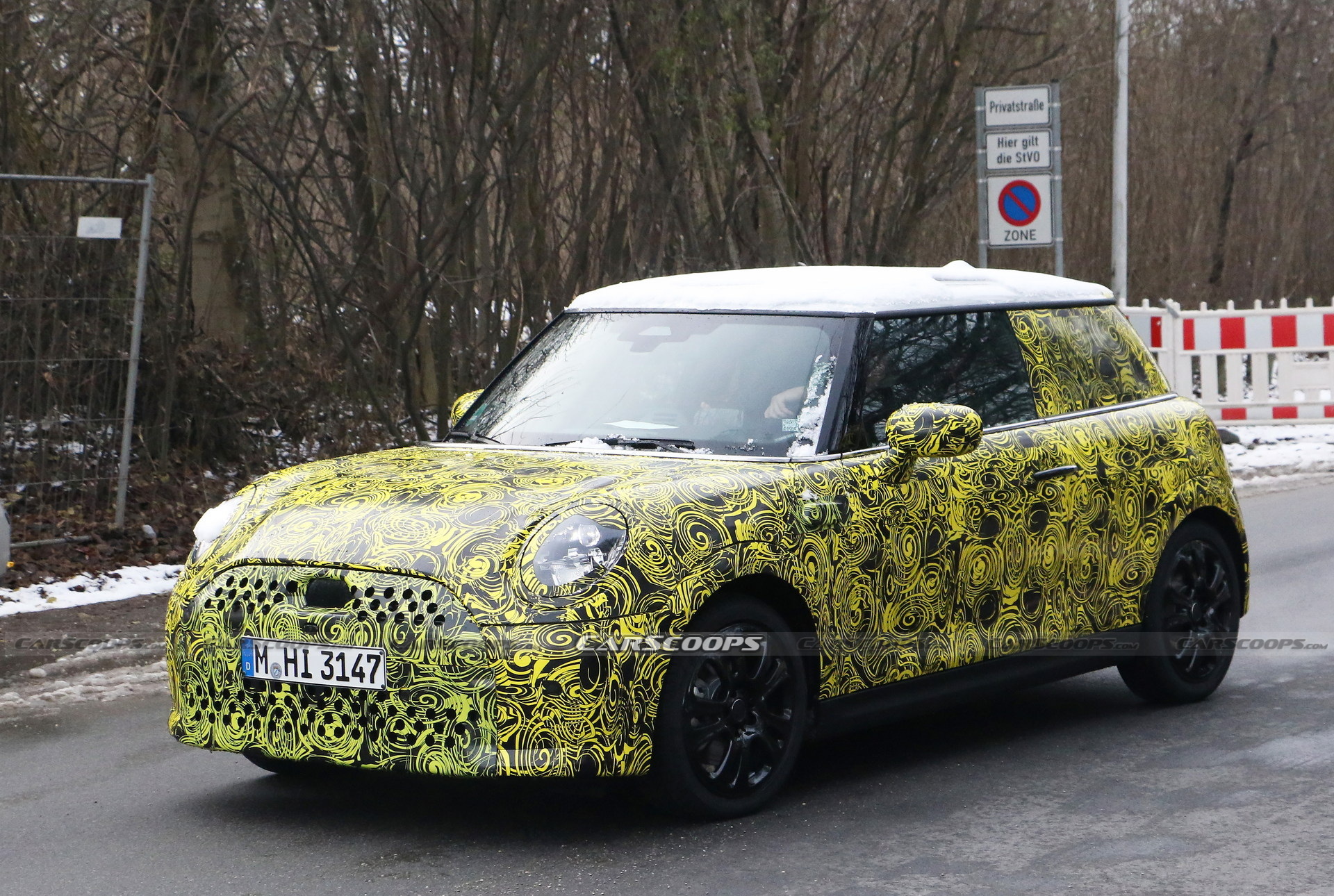 What Is MINI Testing Under The Body Of Current Hatch?