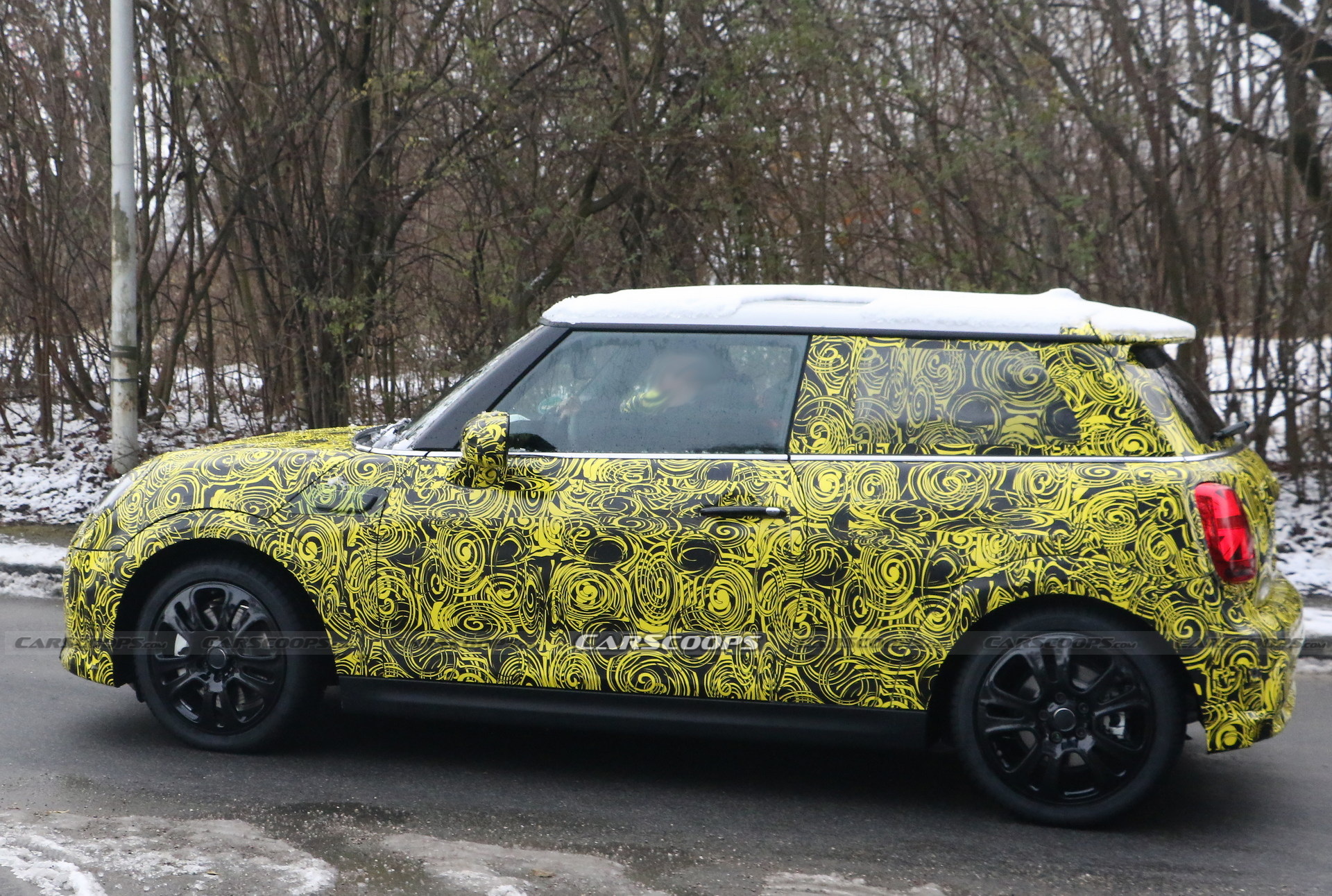 What Is MINI Testing Under The Body Of Current Hatch?