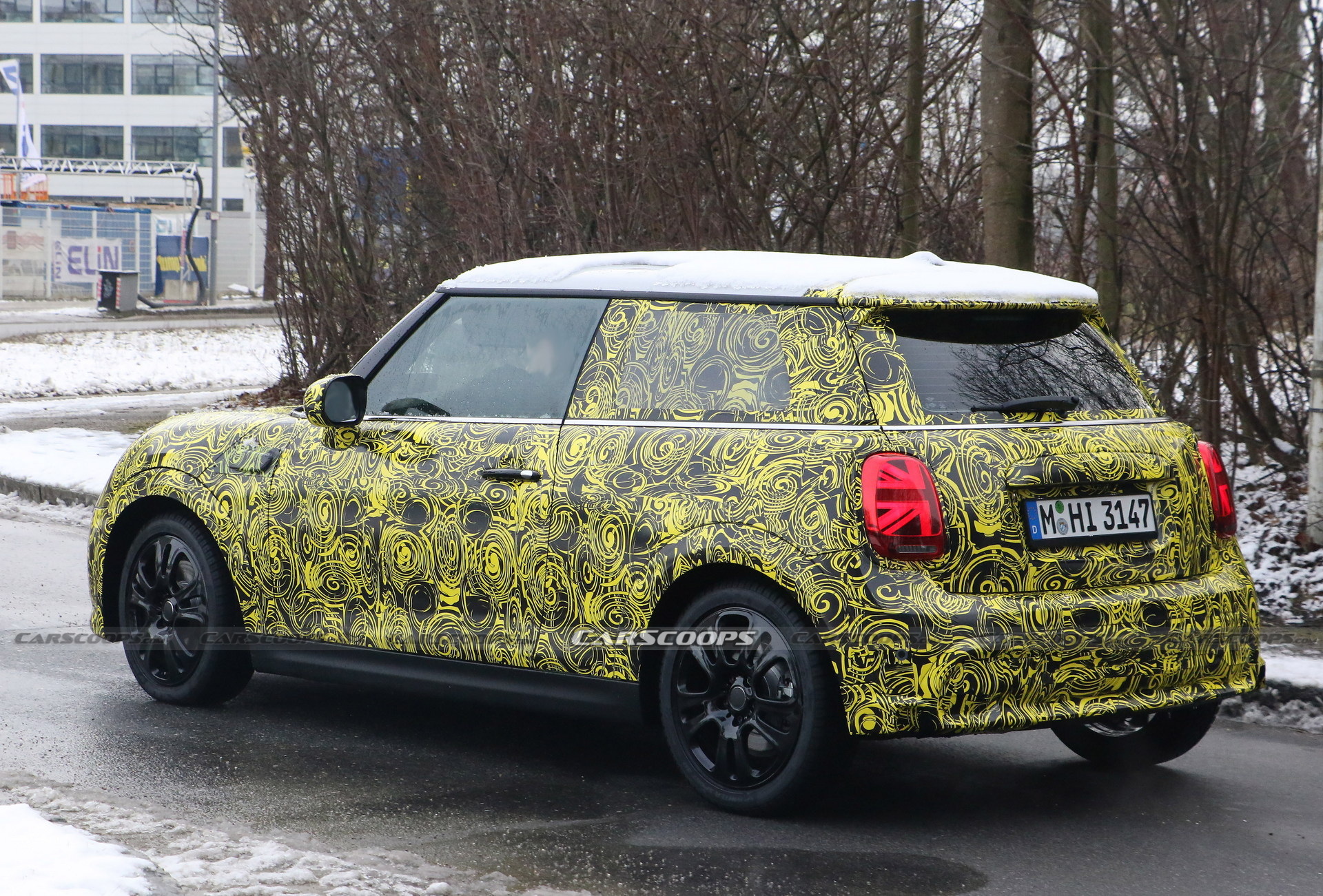 What Is MINI Testing Under The Body Of Current Hatch?