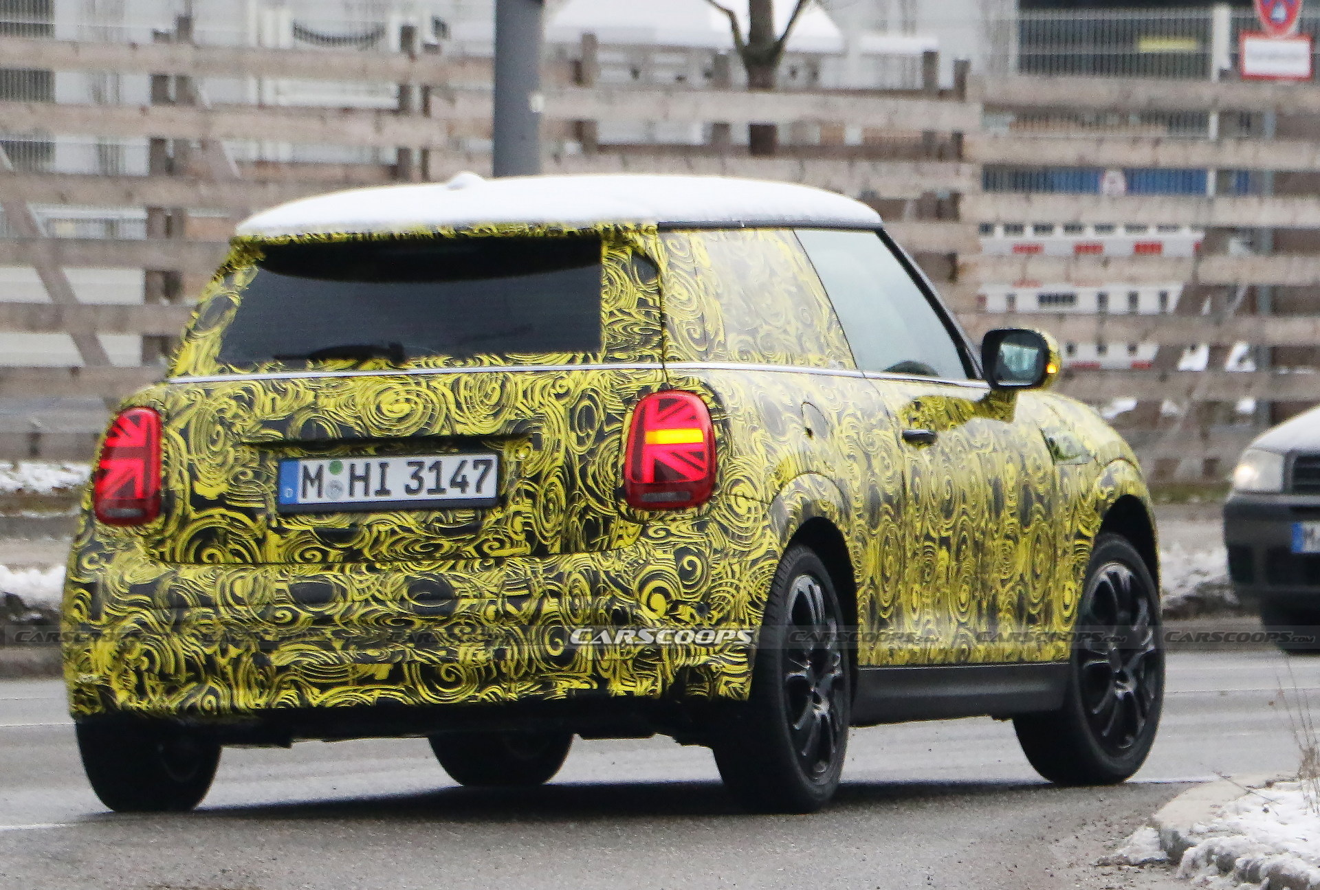 What Is MINI Testing Under The Body Of Current Hatch?