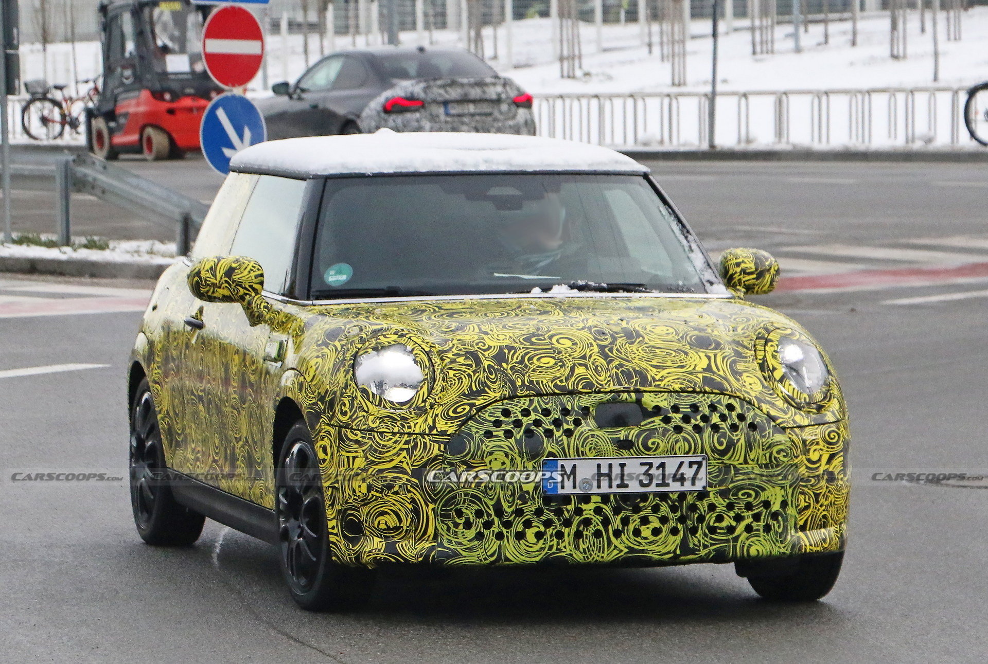 What Is MINI Testing Under The Body Of Current Hatch?