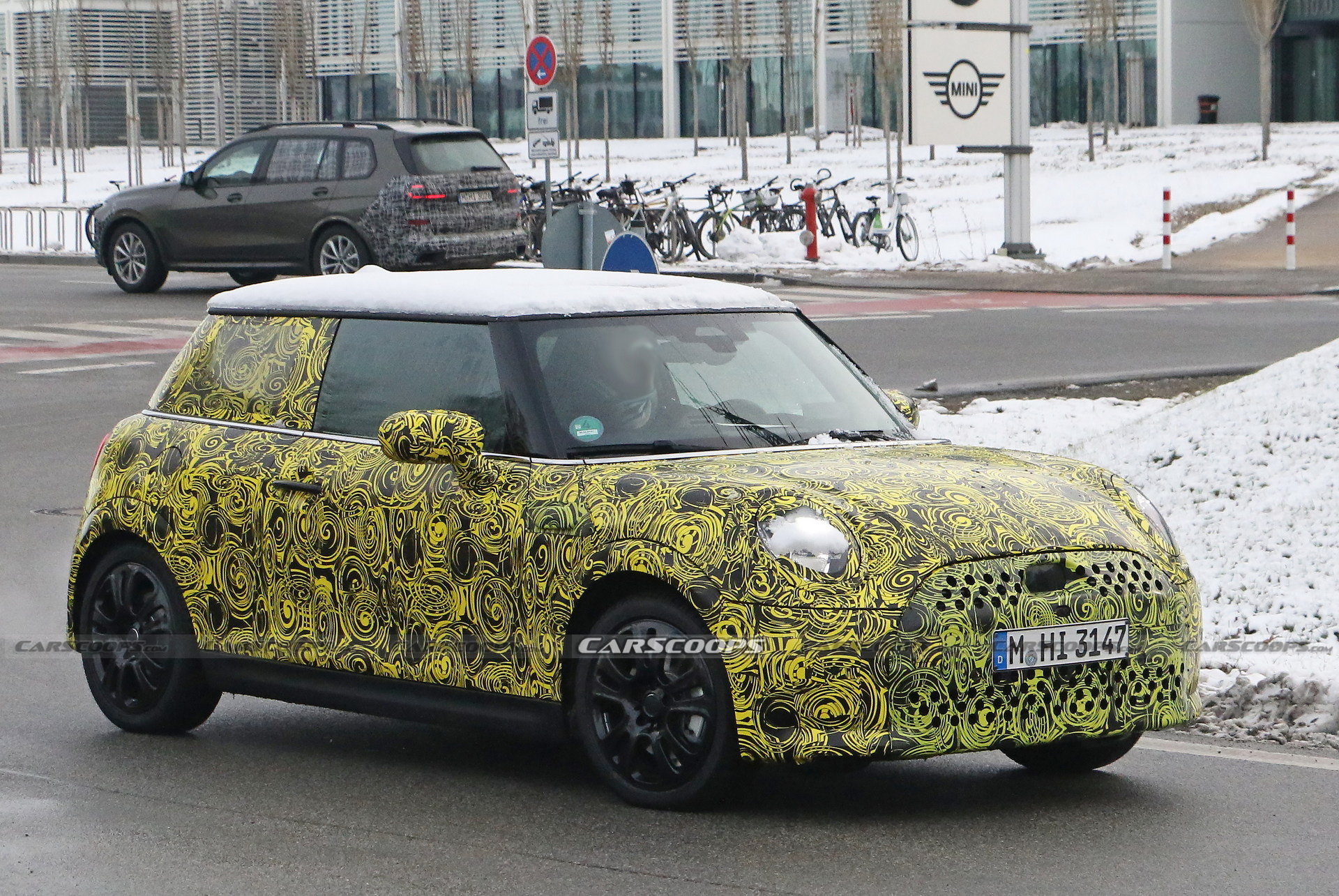 What Is MINI Testing Under The Body Of Current Hatch?