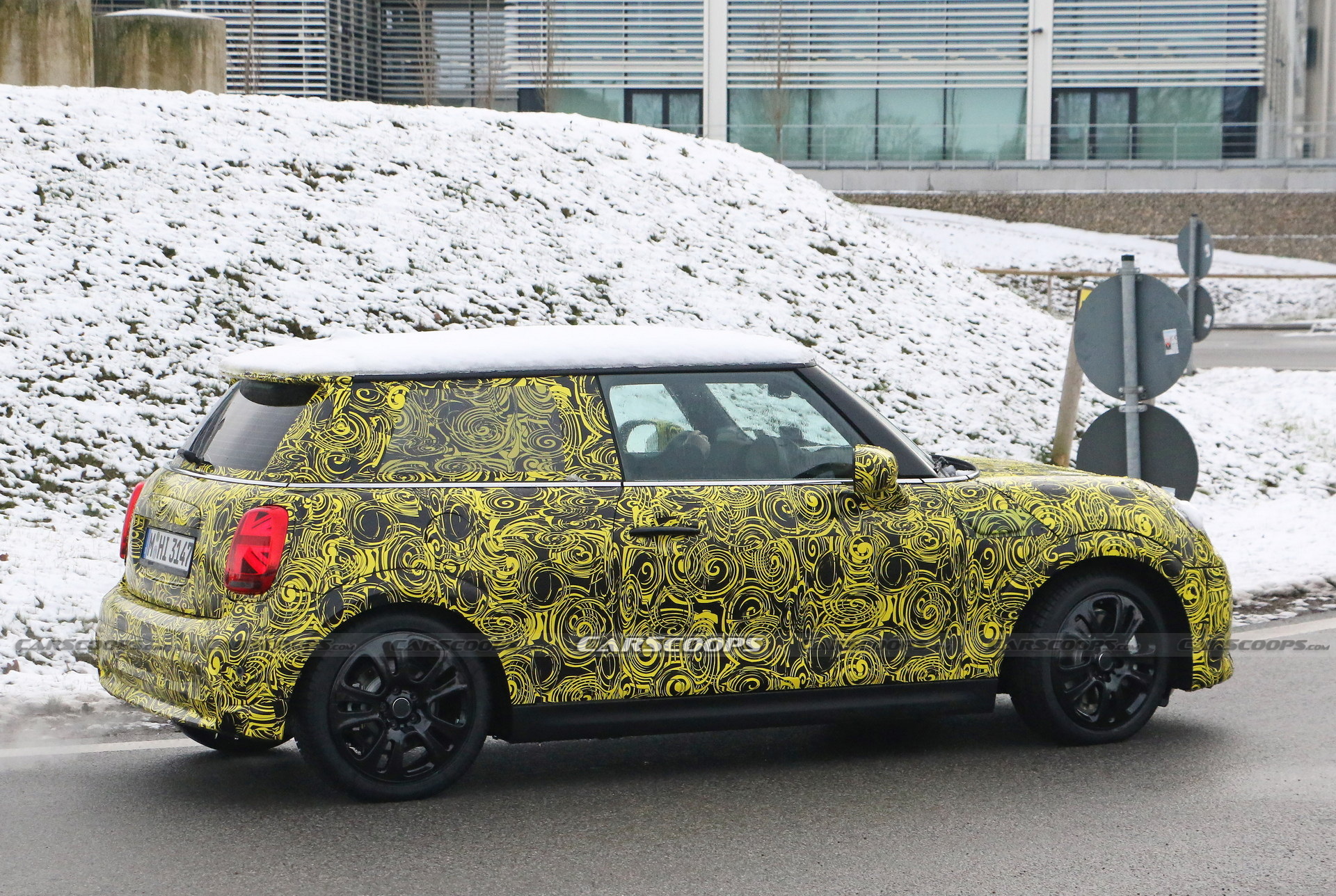 What Is MINI Testing Under The Body Of Current Hatch?