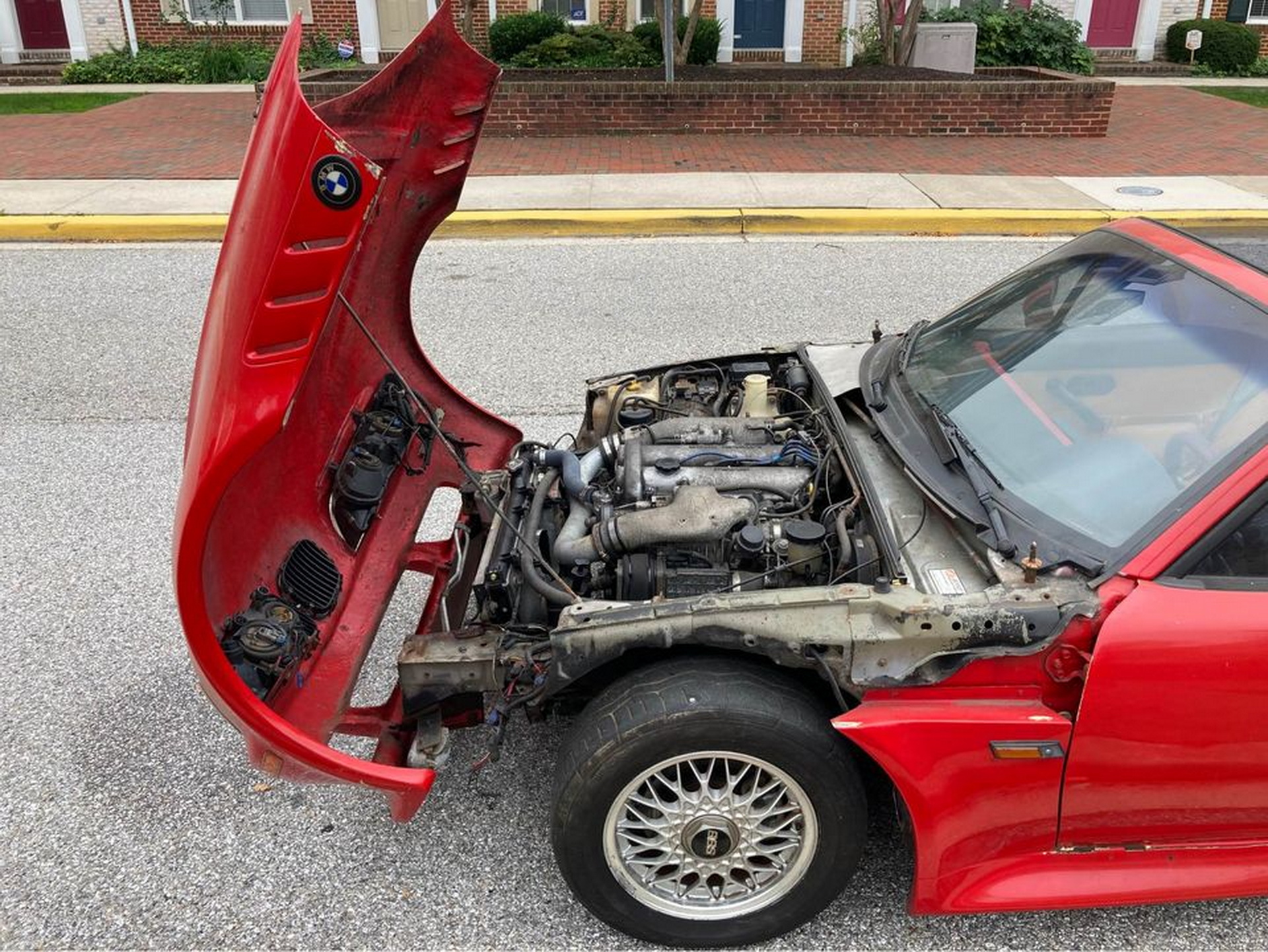 A First Gen Mazda MX-5 Does A Not-So-Convincing BMW Z3 Impersonation
