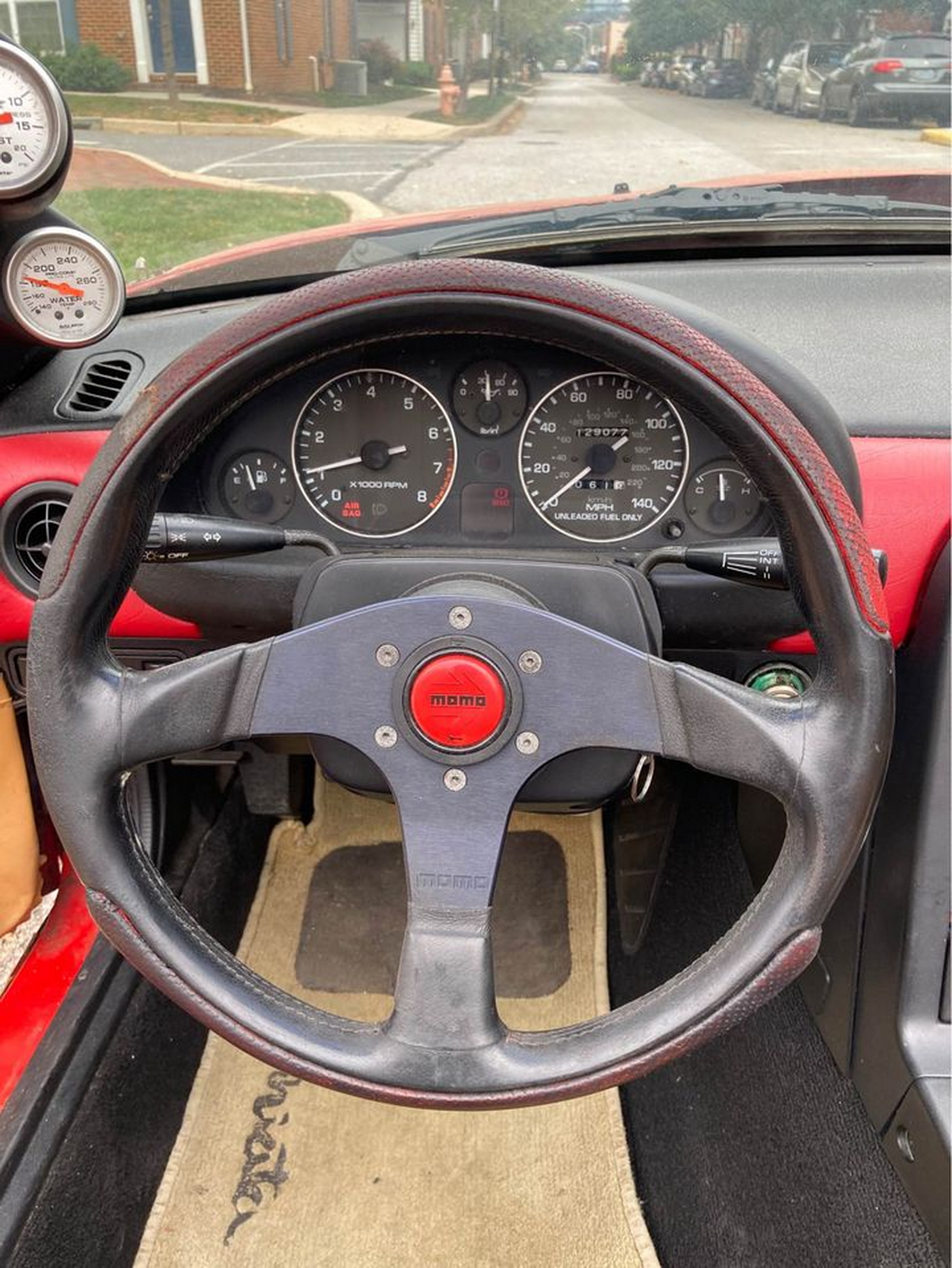 A First Gen Mazda MX-5 Does A Not-So-Convincing BMW Z3 Impersonation