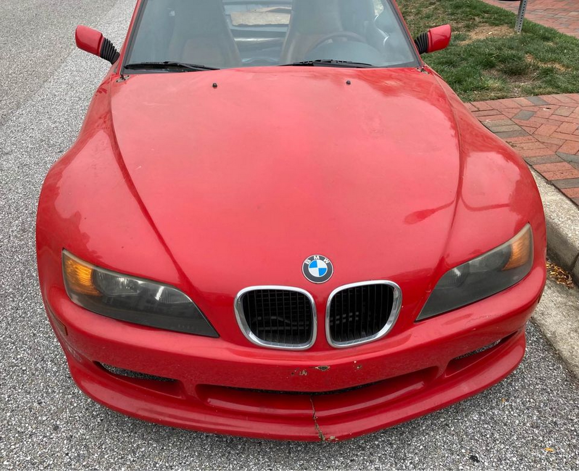 A First Gen Mazda MX-5 Does A Not-So-Convincing BMW Z3 Impersonation