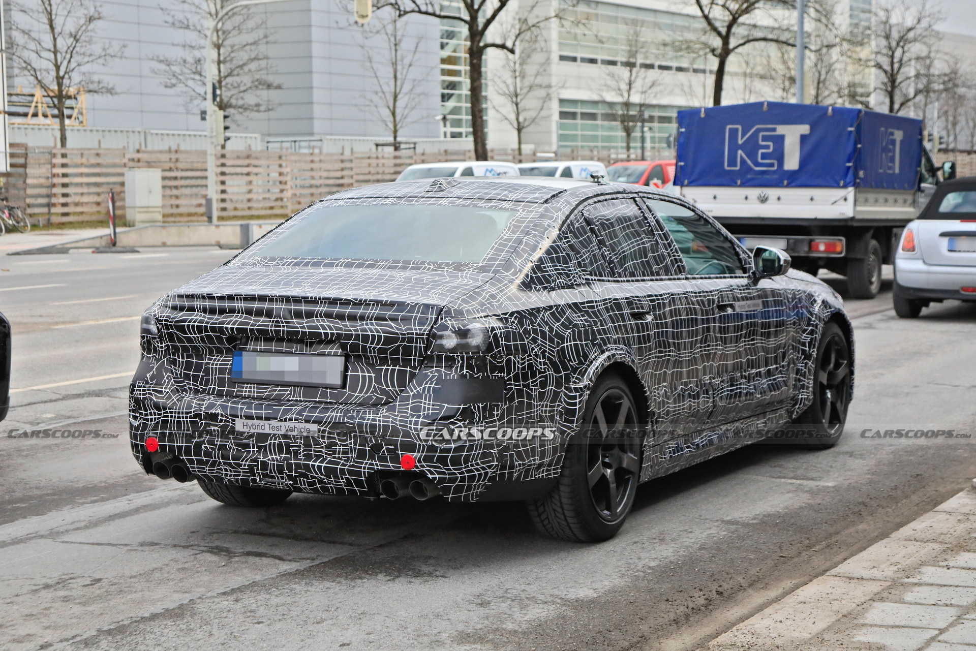 2025 BMW M5 Hybrid Makes Spy Debut Showing Its Aggressive Bodykit
