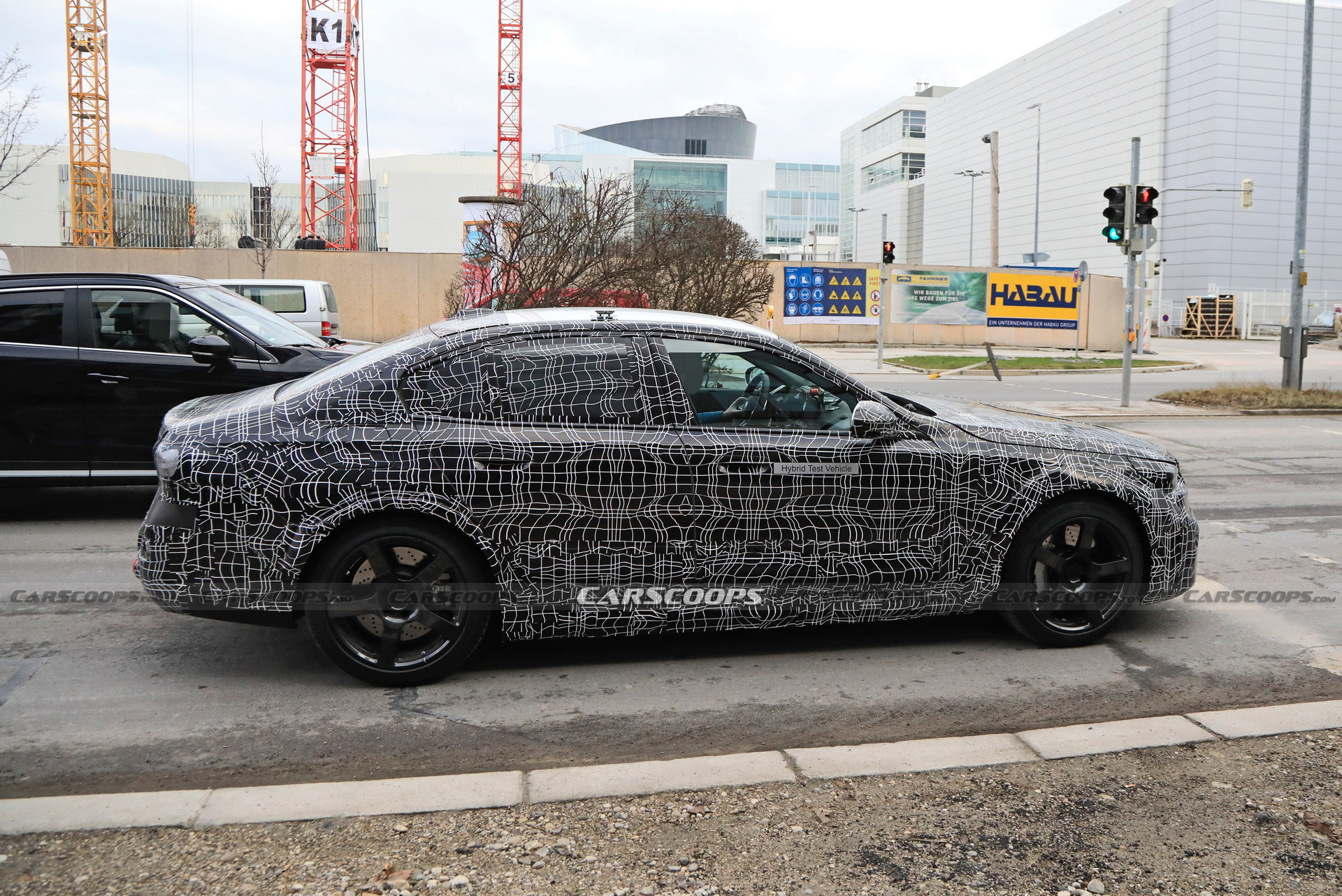 2025 BMW M5 Hybrid Makes Spy Debut Showing Its Aggressive Bodykit