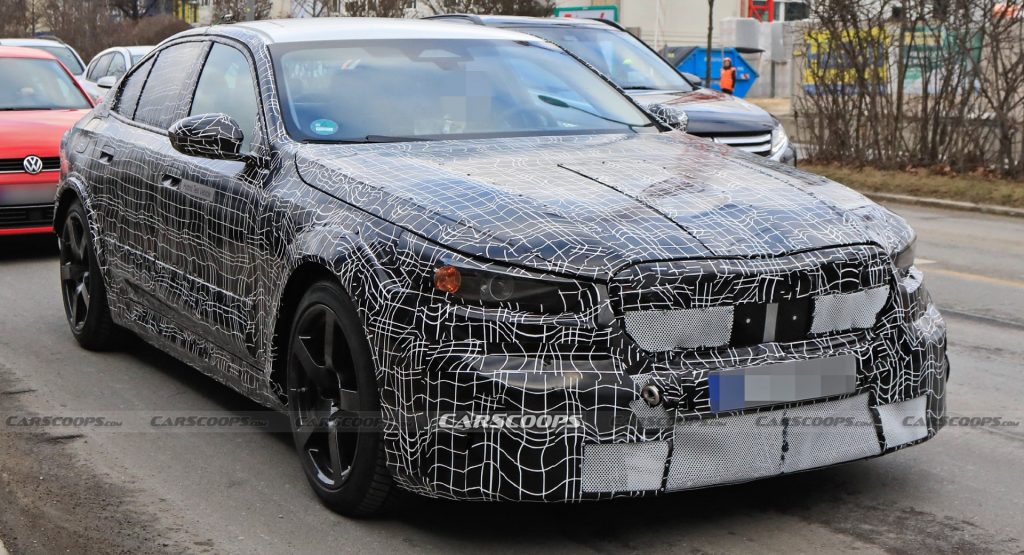  2025 BMW M5 Hybrid Makes Spy Debut Showing Its Aggressive Bodykit