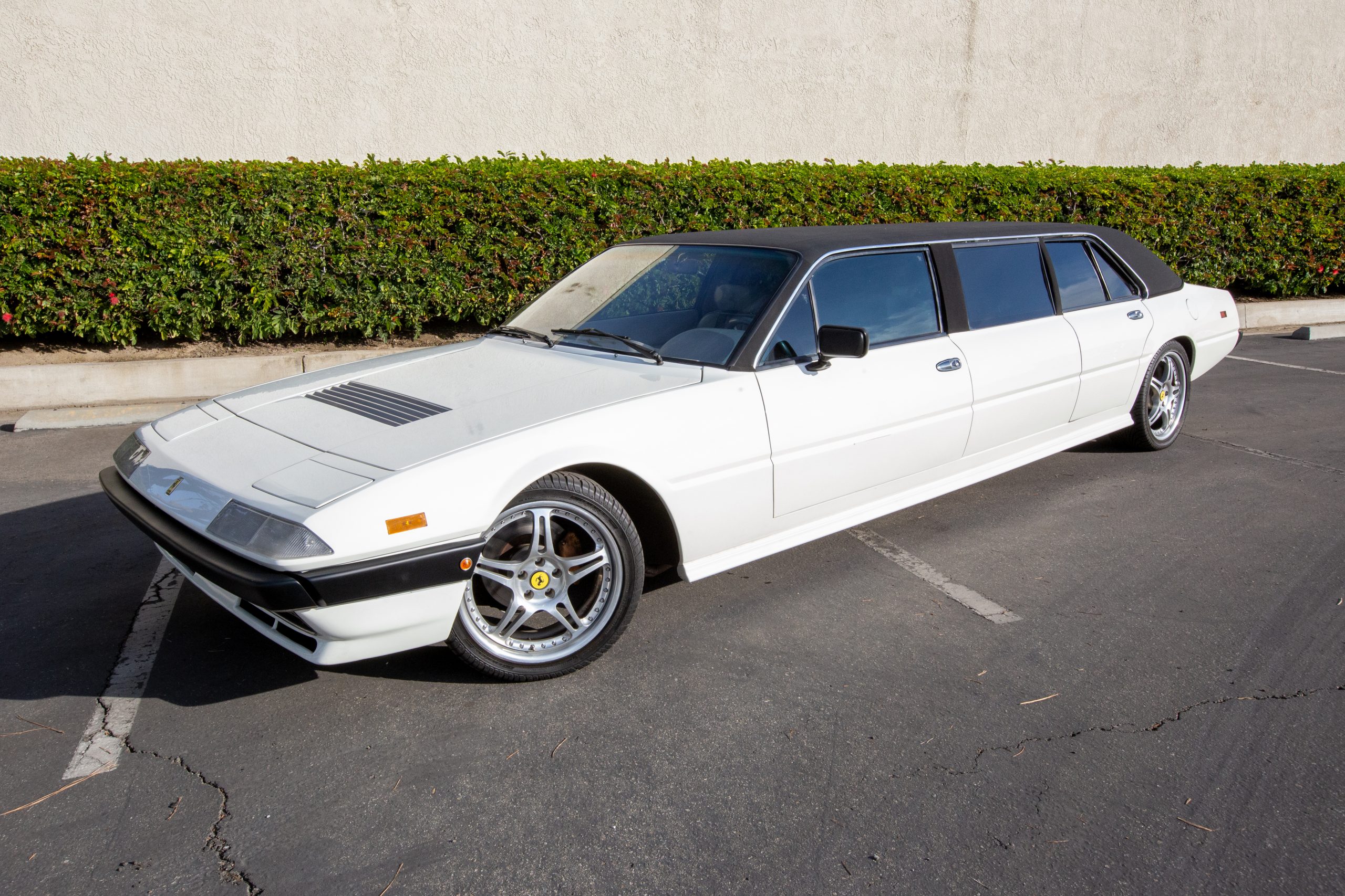 Will Barrett-Jackson Manage To Sell This Bizarre Ferrari 400i Limousine?