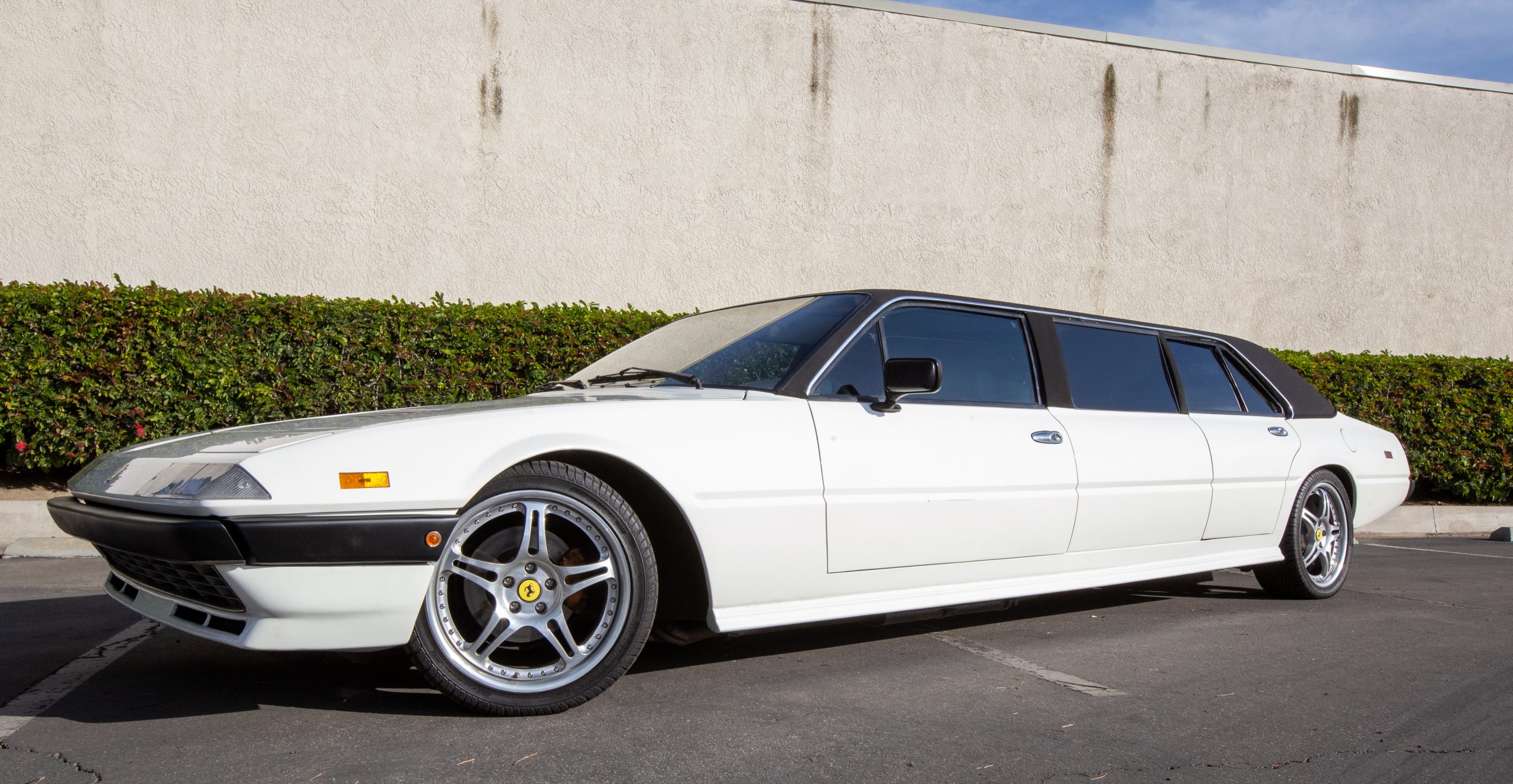 Will Barrett-Jackson Manage To Sell This Bizarre Ferrari 400i Limousine?