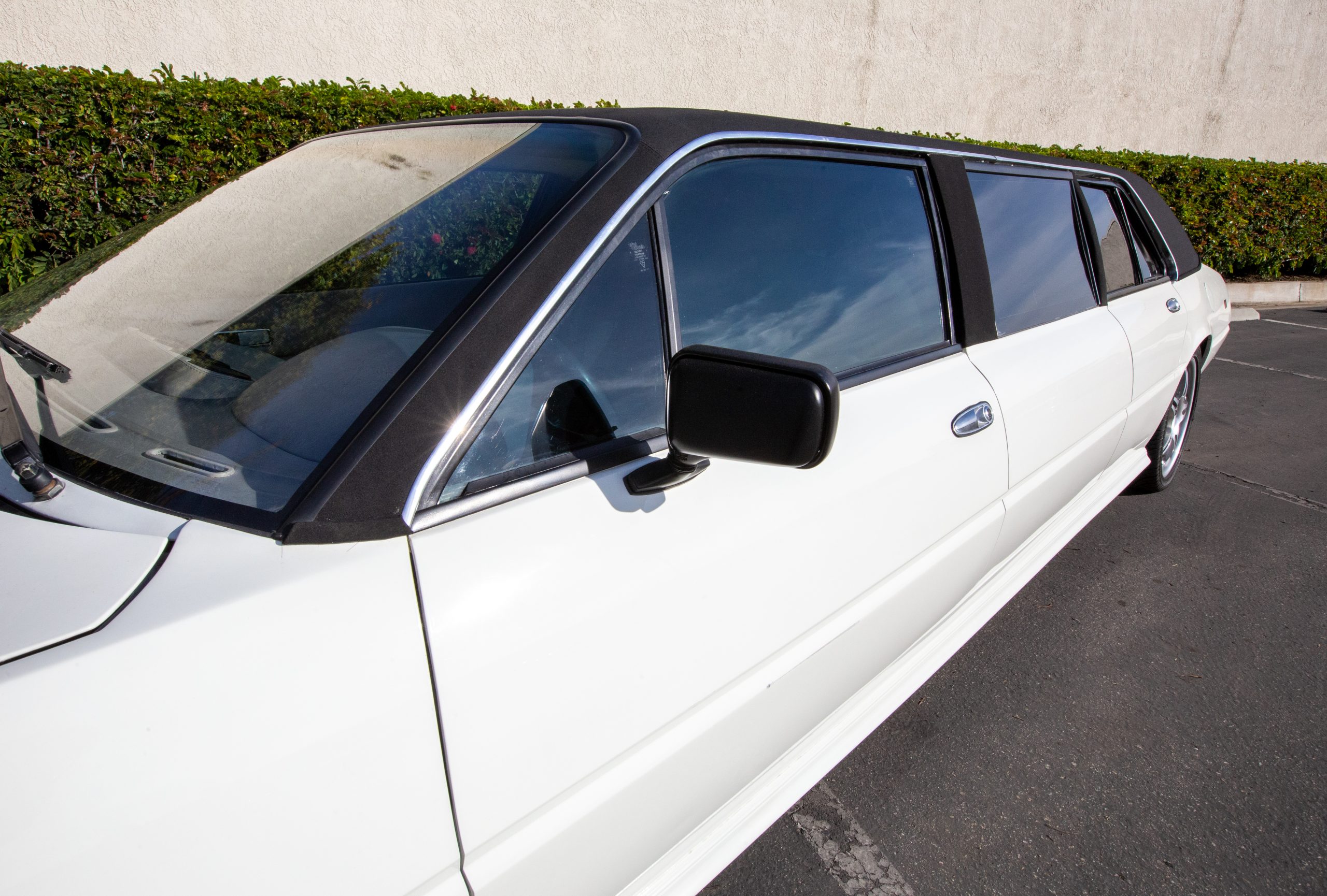 Will Barrett-Jackson Manage To Sell This Bizarre Ferrari 400i Limousine?