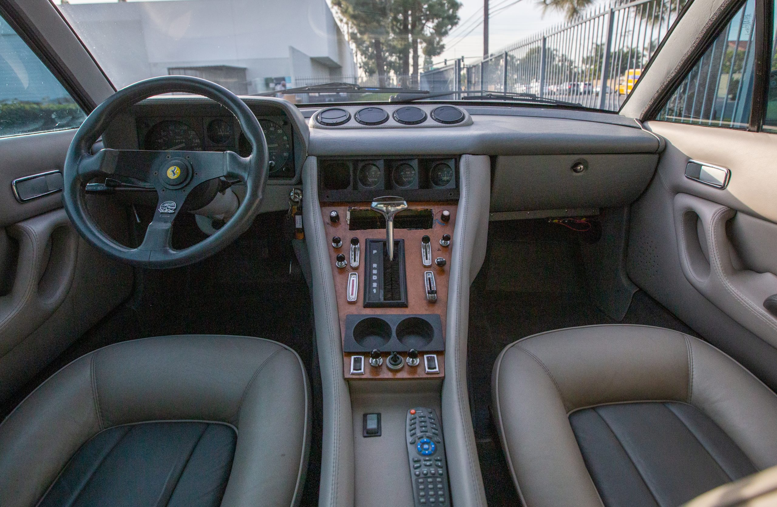 Will Barrett-Jackson Manage To Sell This Bizarre Ferrari 400i Limousine?