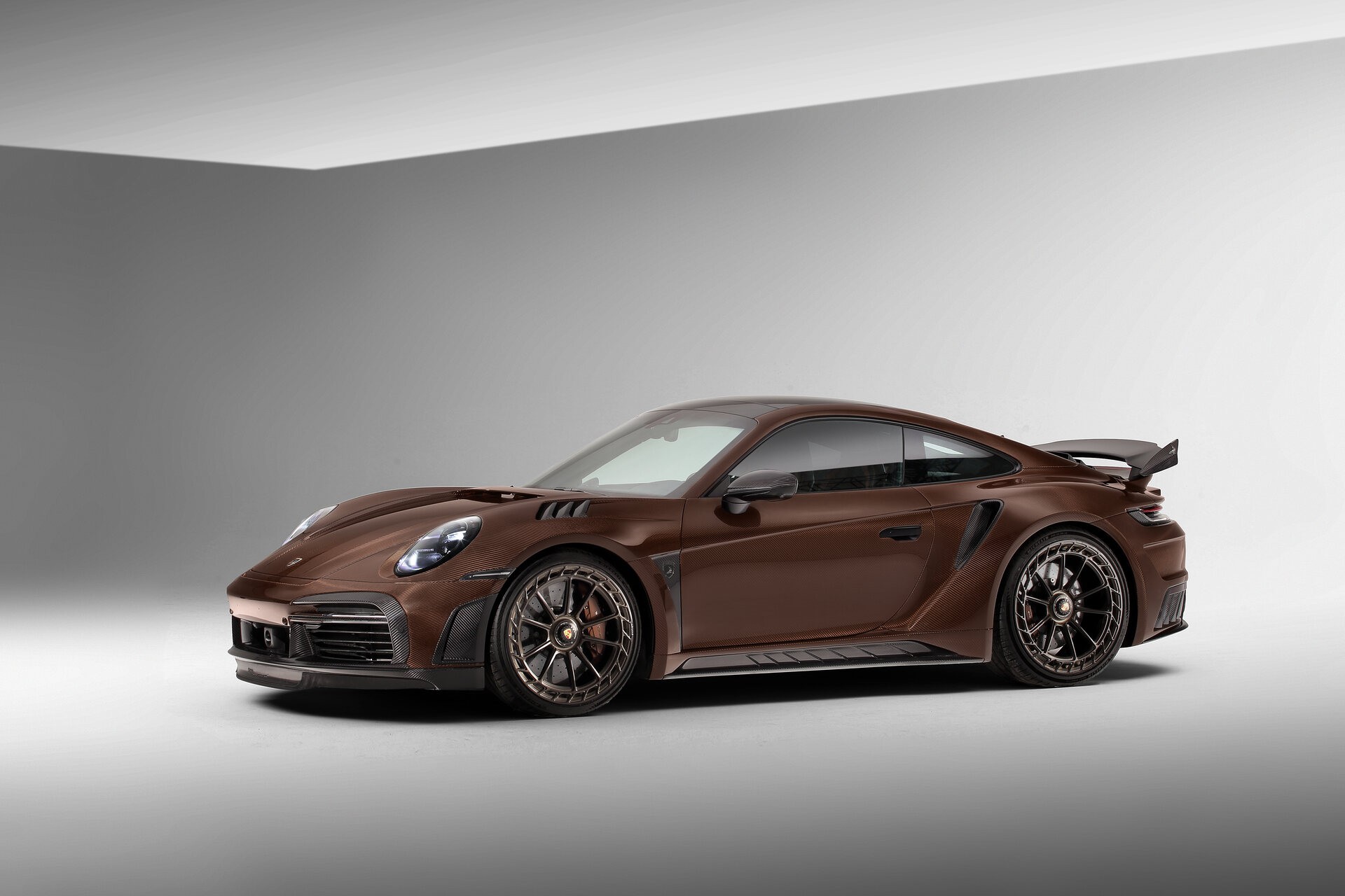 TopCar Dresses Their Tuned Porsche 911 Turbo S In Brown Carbon Fiber