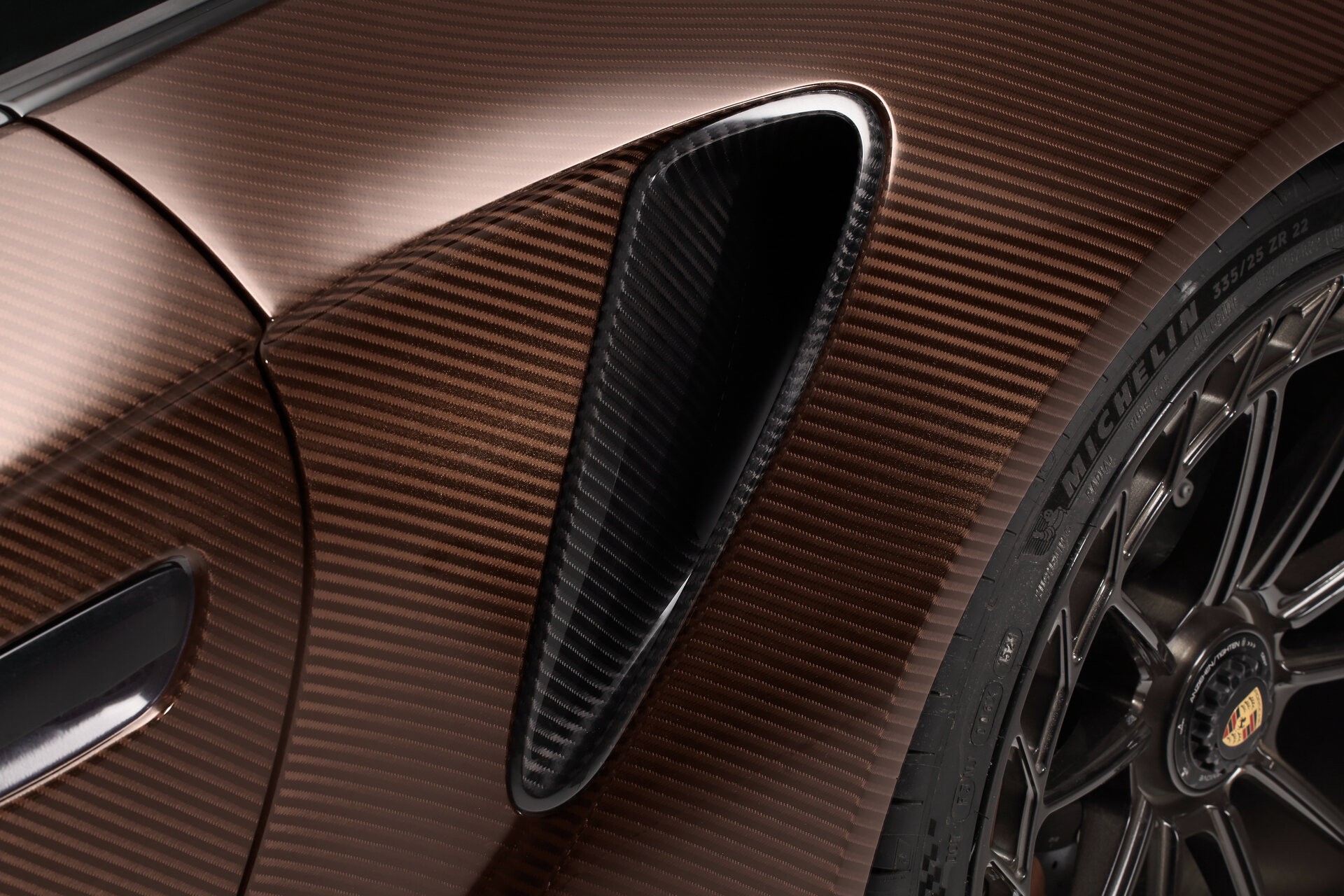 TopCar Dresses Their Tuned Porsche 911 Turbo S In Brown Carbon Fiber