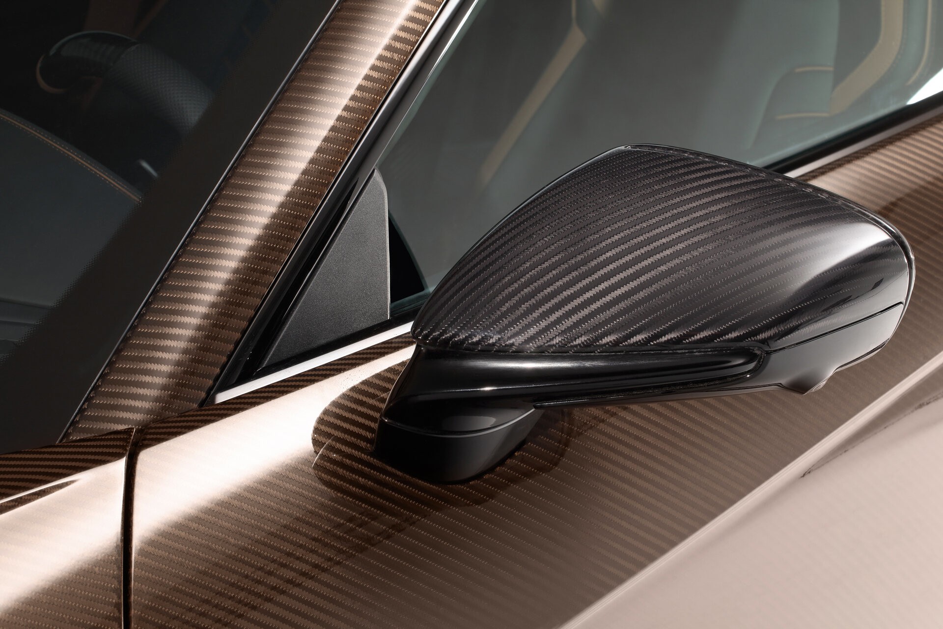 TopCar Dresses Their Tuned Porsche 911 Turbo S In Brown Carbon Fiber