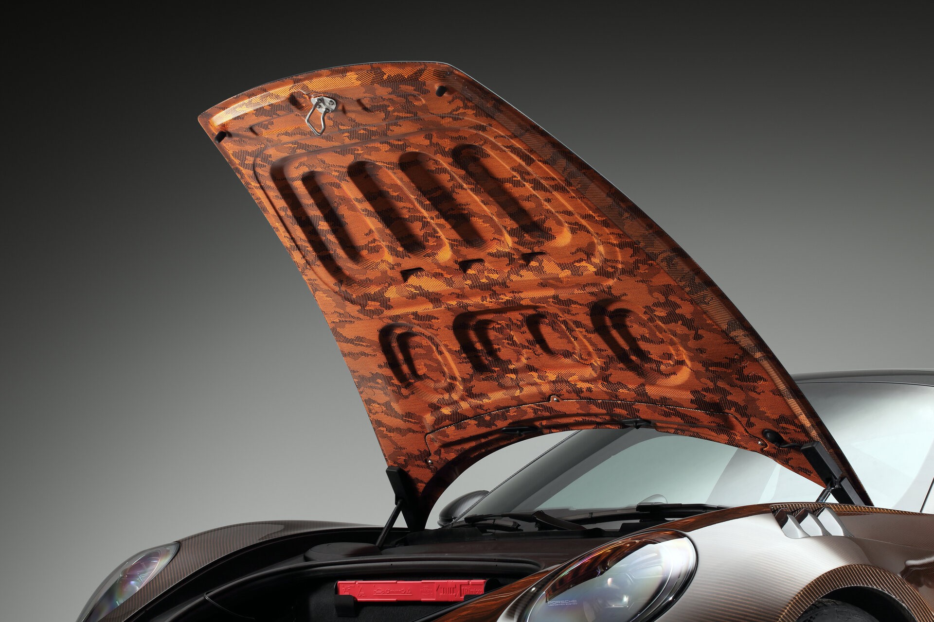 TopCar Dresses Their Tuned Porsche 911 Turbo S In Brown Carbon Fiber