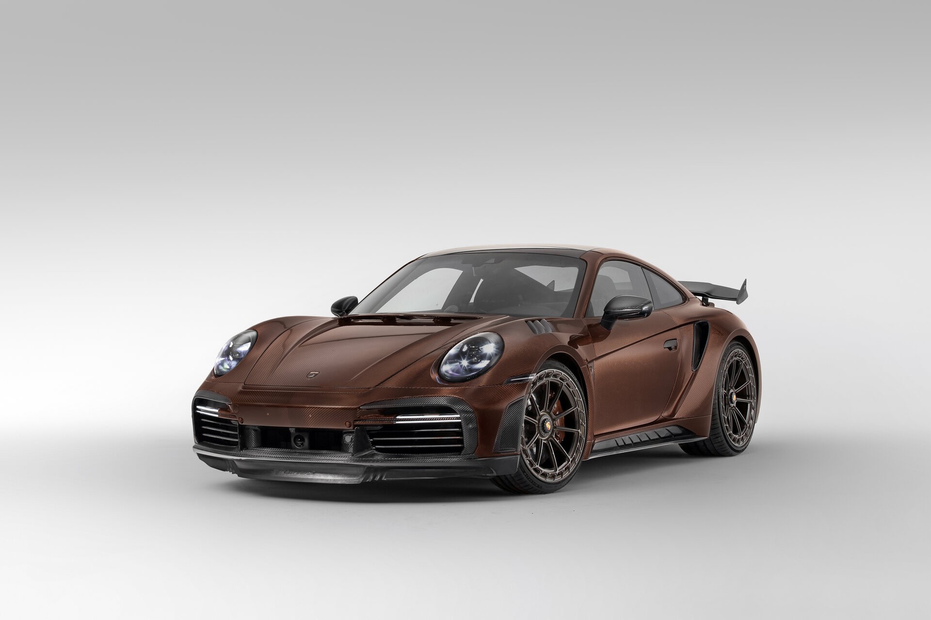 TopCar Dresses Their Tuned Porsche 911 Turbo S In Brown Carbon Fiber