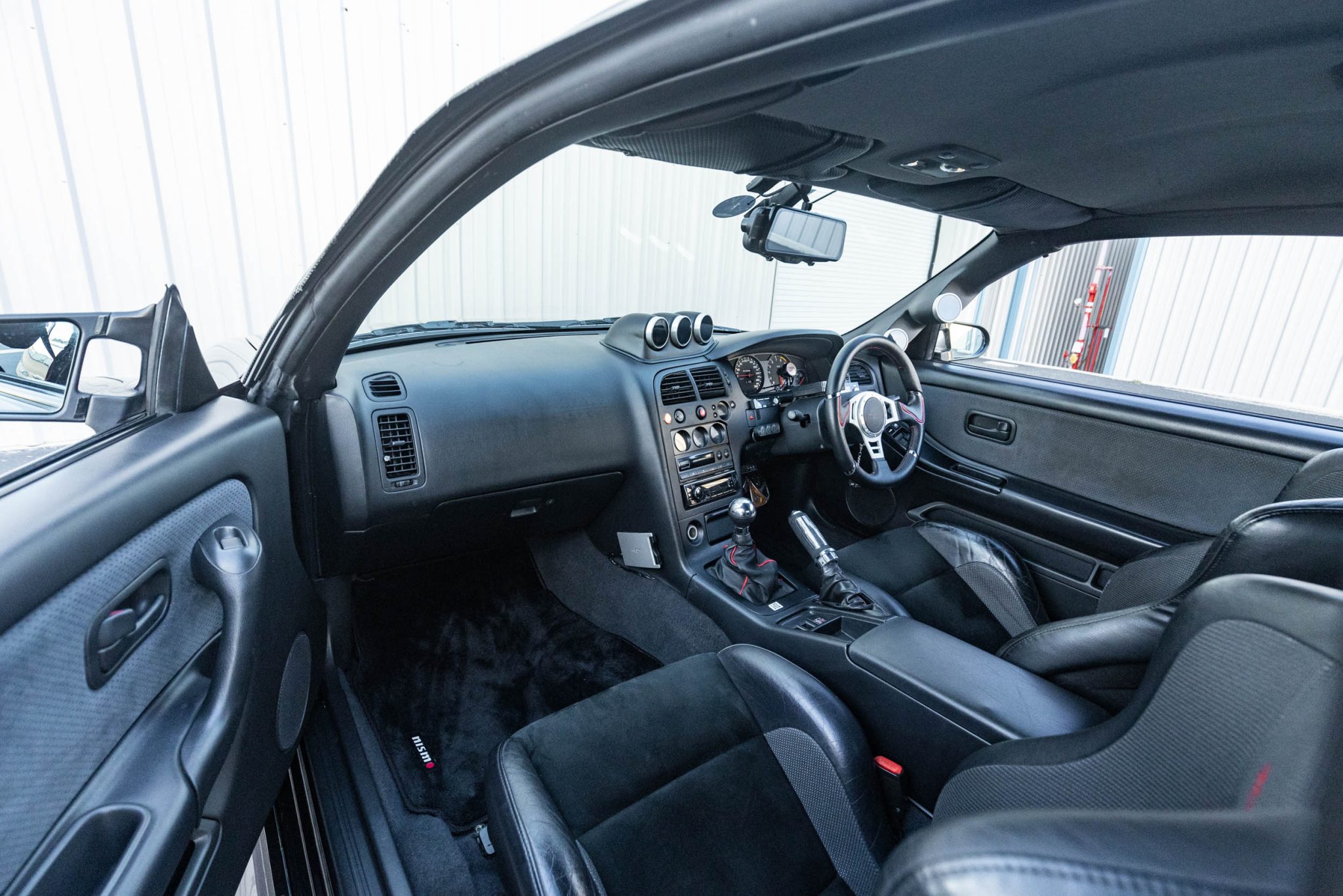 Time To Find Out How Much This Midnight Purple Nissan R33 Skyline GT-R V-Spec Is Worth