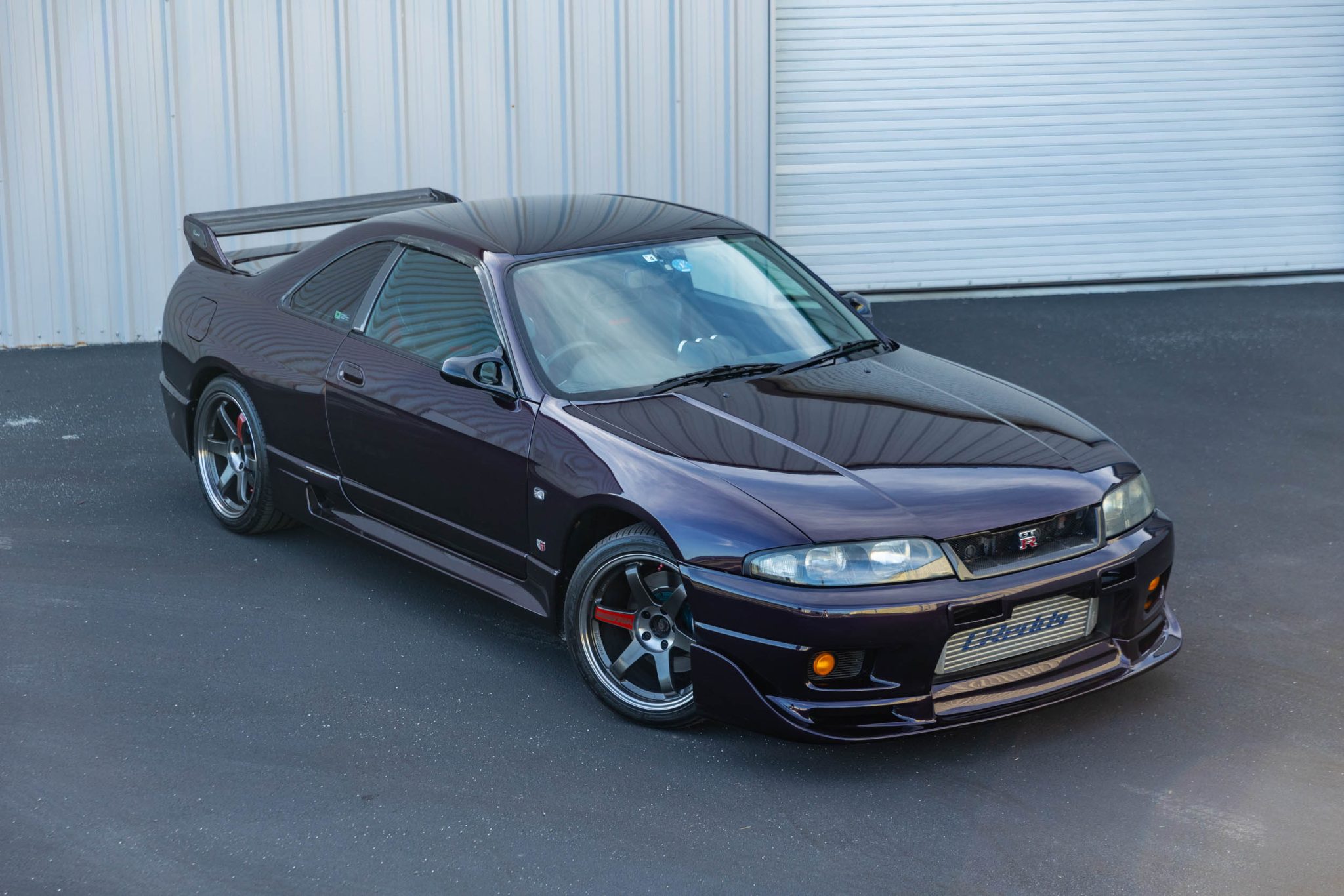 Time To Find Out How Much This Midnight Purple Nissan R33 Skyline GT-R V-Spec Is Worth