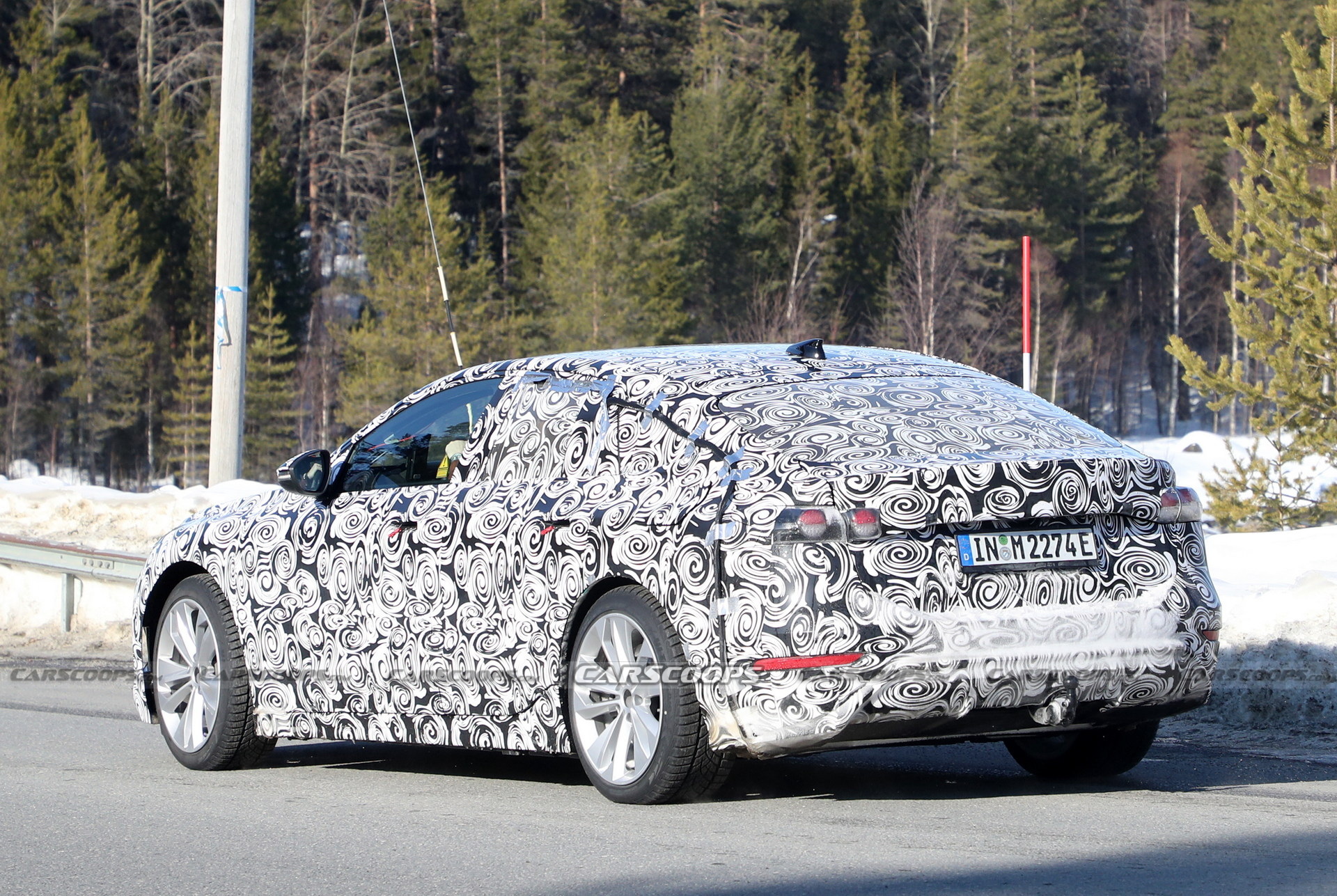 2024 Audi A6 E-Tron Spied Again Showing Split Headlights And Toned-Down Styling