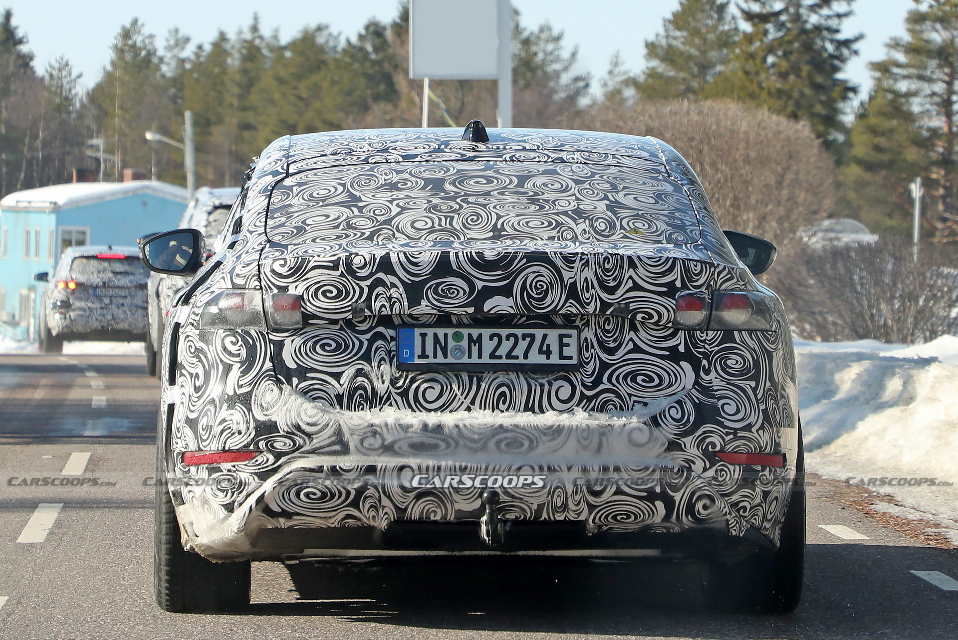 2024 Audi A6 E-Tron Spied Again Showing Split Headlights And Toned-Down Styling