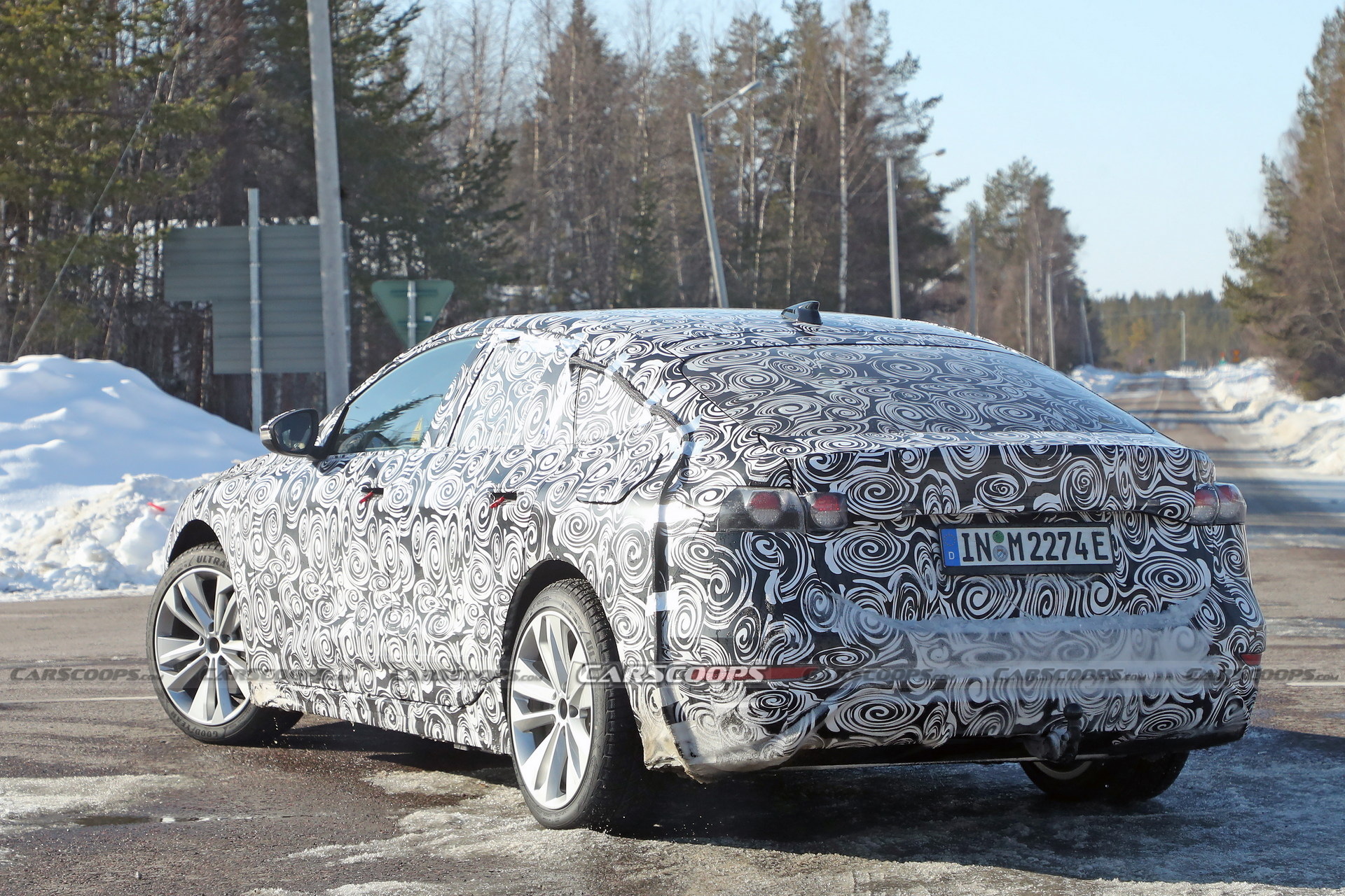 2024 Audi A6 E-Tron Spied Again Showing Split Headlights And Toned-Down Styling