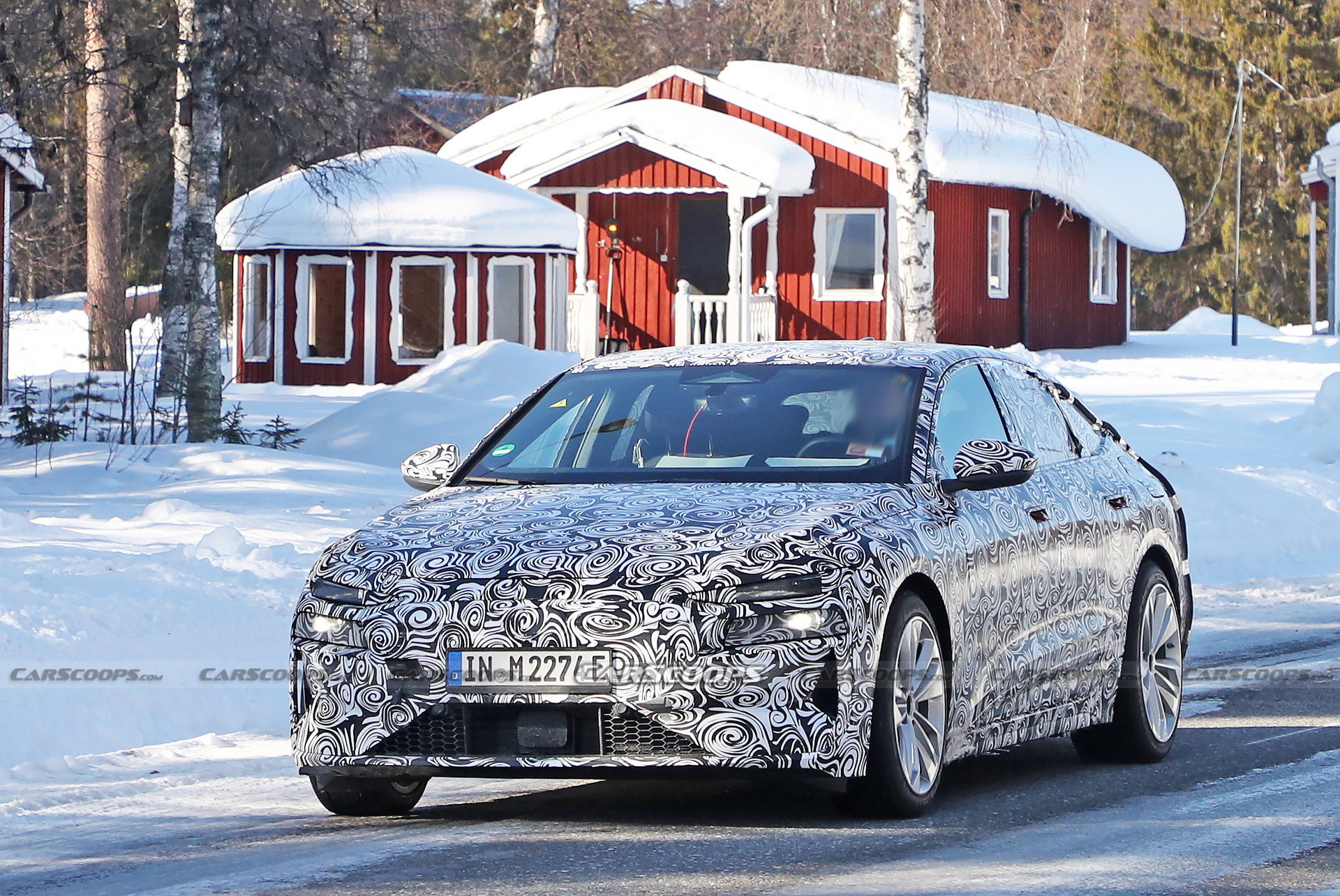 2024 Audi A6 E-Tron Spied Again Showing Split Headlights And Toned-Down Styling