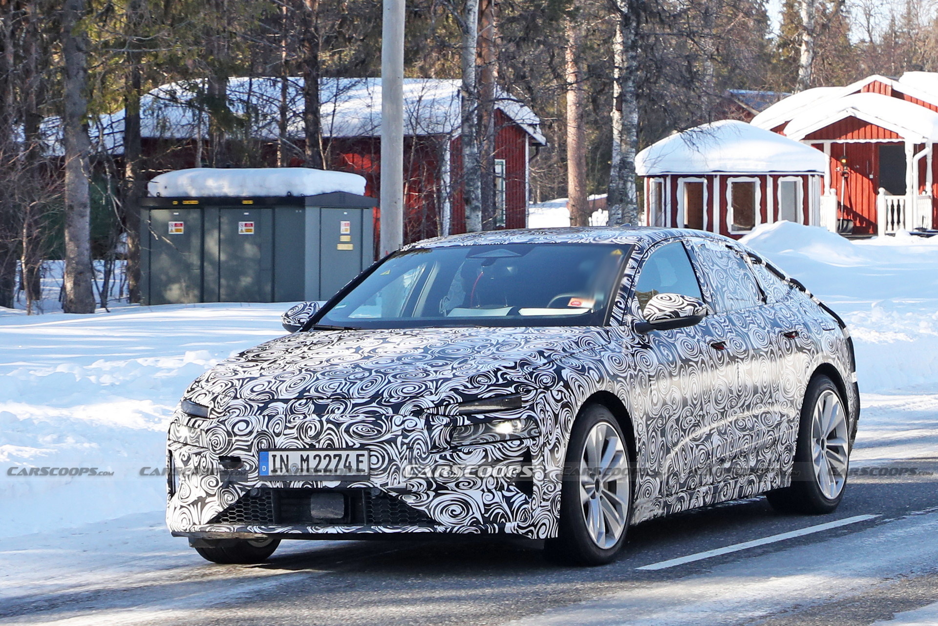2024 Audi A6 E-Tron Spied Again Showing Split Headlights And Toned-Down Styling