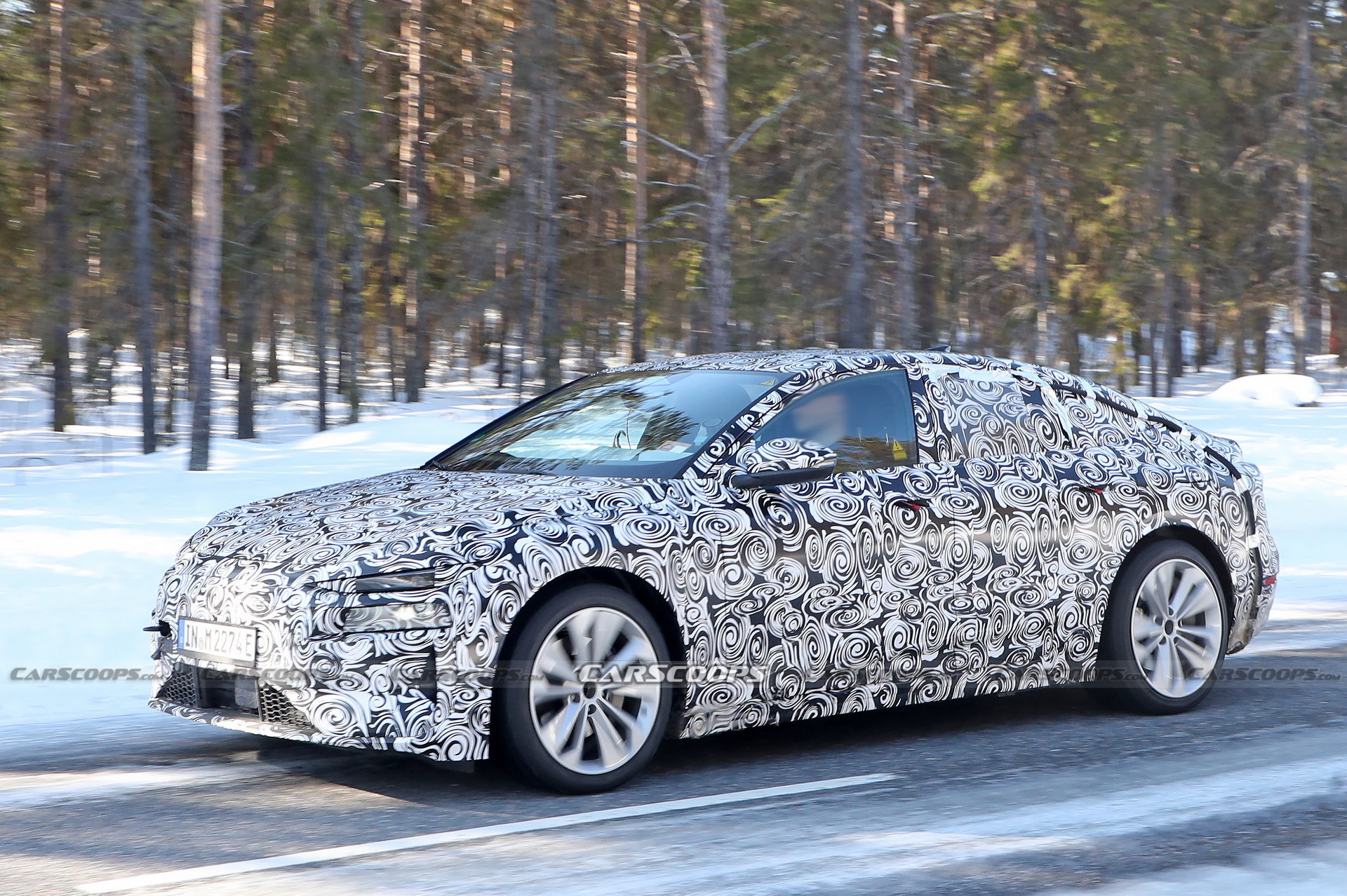 2024 Audi A6 E-Tron Spied Again Showing Split Headlights And Toned-Down Styling