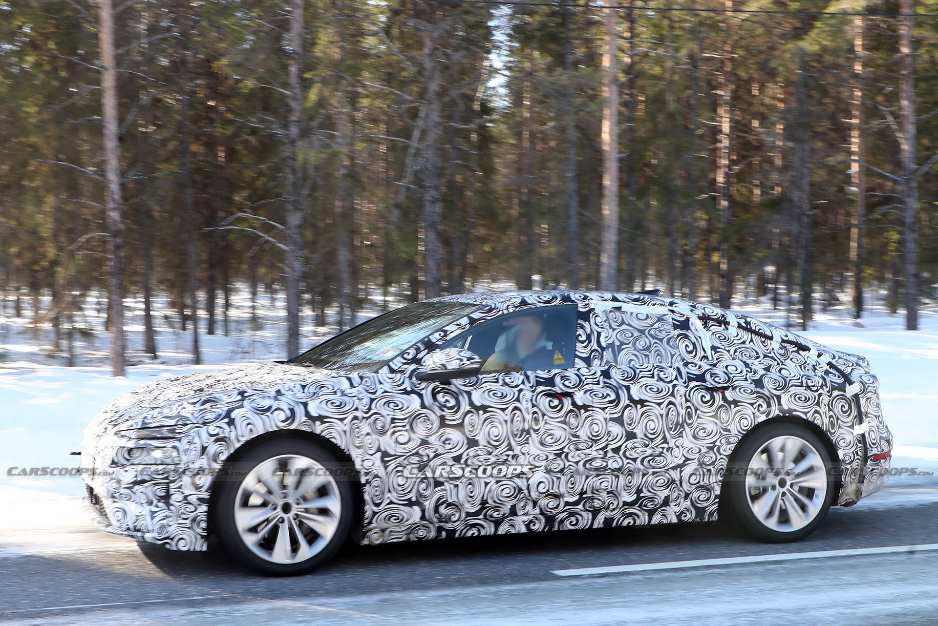 2024 Audi A6 E-Tron Spied Again Showing Split Headlights And Toned-Down Styling