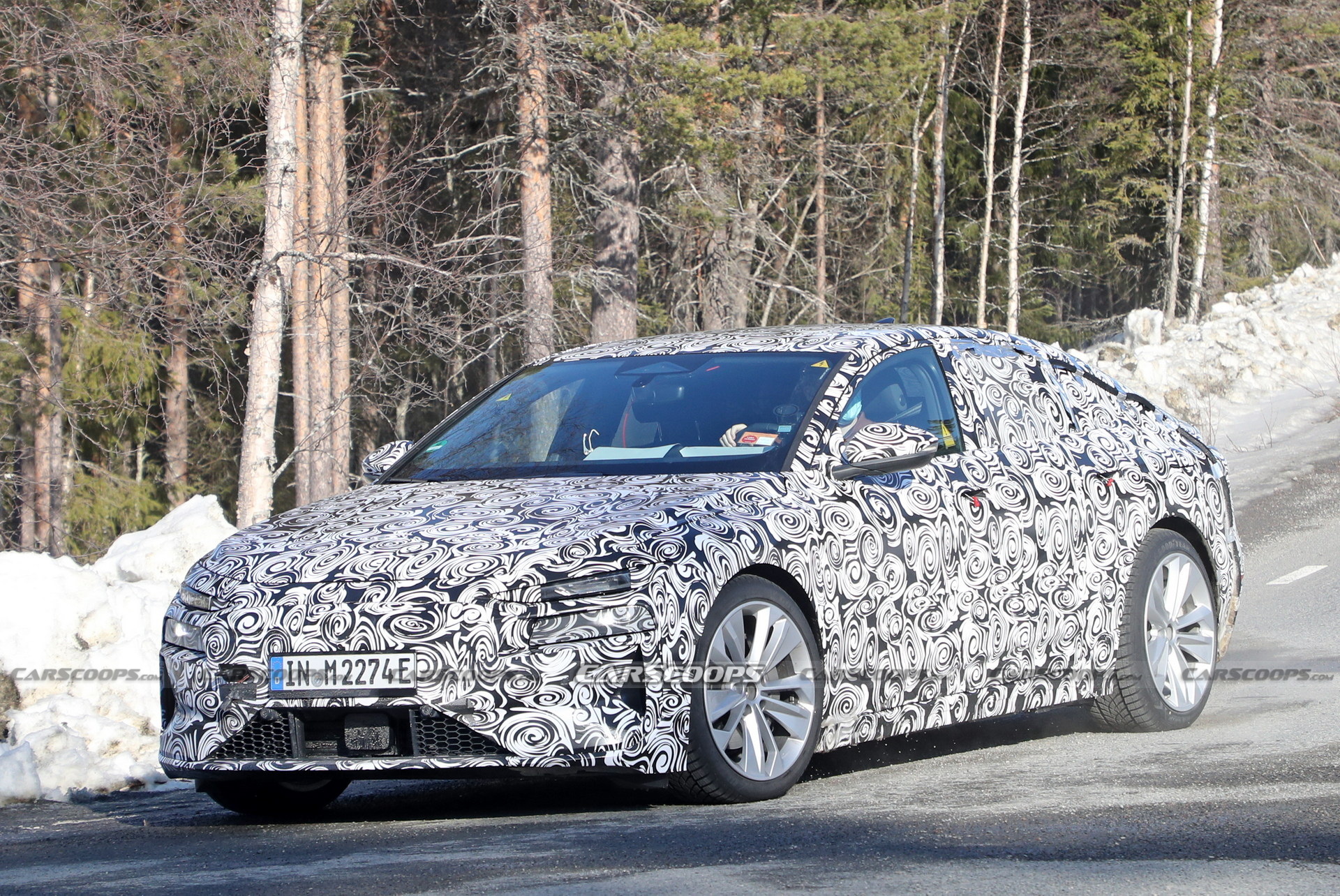 2024 Audi A6 E-Tron Spied Again Showing Split Headlights And Toned-Down Styling