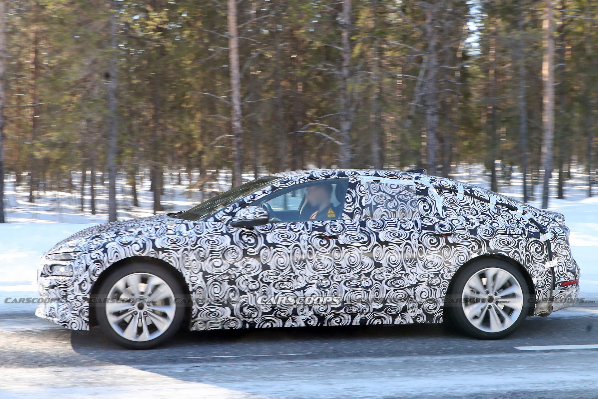 2024 Audi A6 E-Tron Spied Again Showing Split Headlights And Toned-Down Styling