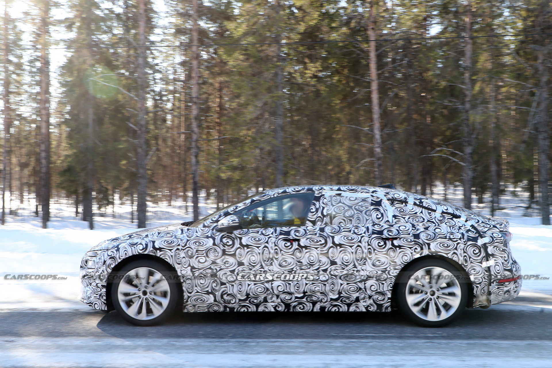 2024 Audi A6 E-Tron Spied Again Showing Split Headlights And Toned-Down Styling