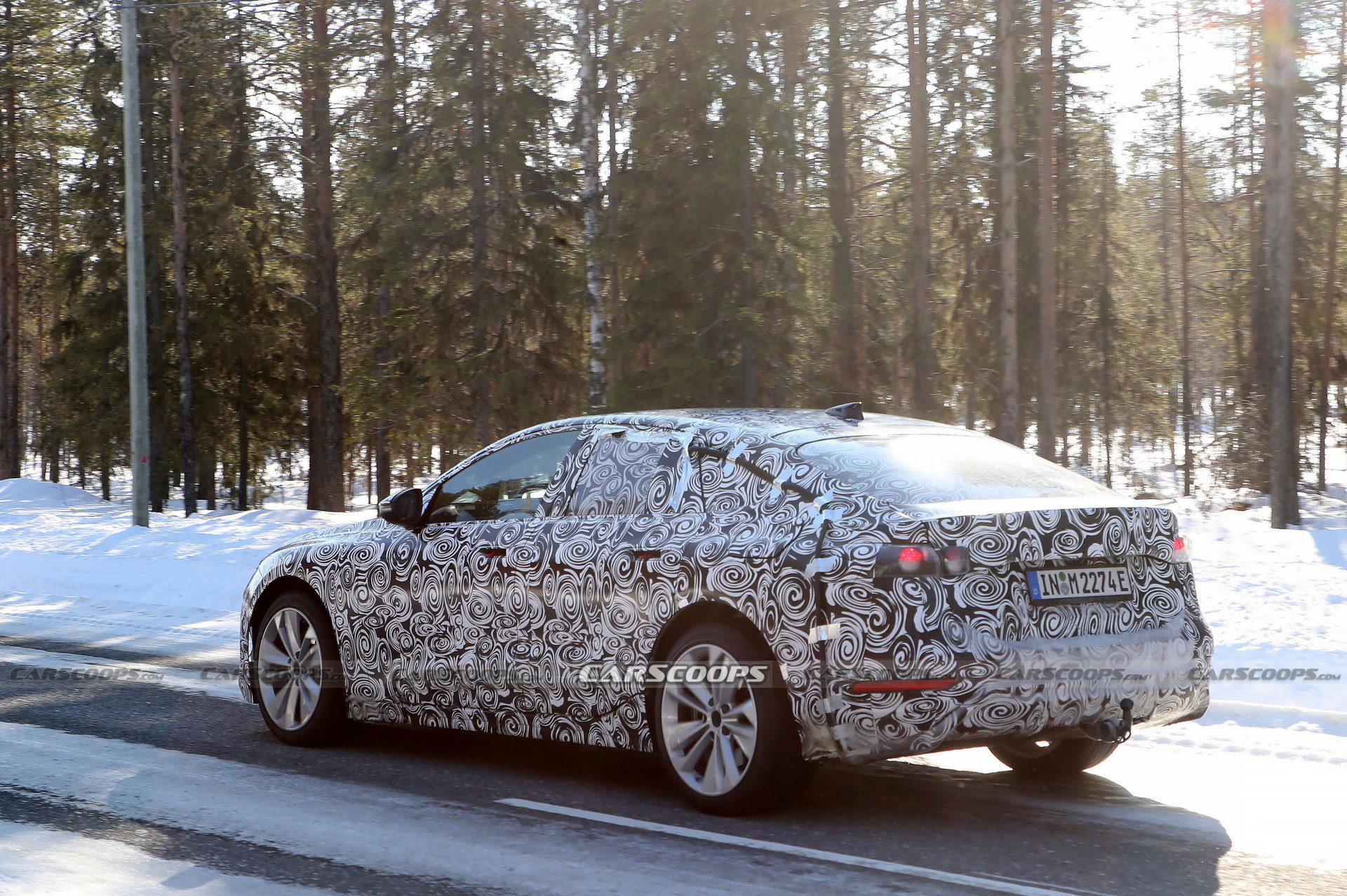 2024 Audi A6 E-Tron Spied Again Showing Split Headlights And Toned-Down Styling