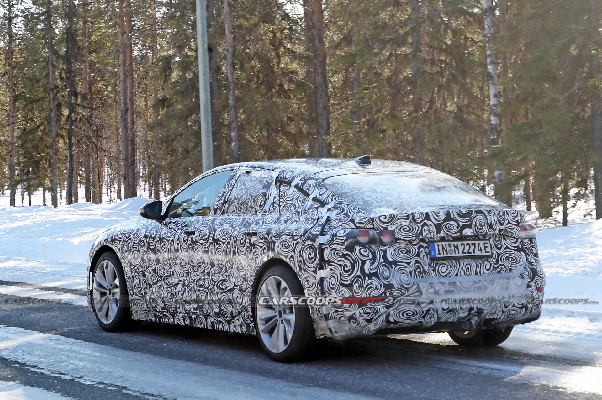 2024 Audi A6 E-Tron Spied Again Showing Split Headlights And Toned-Down Styling