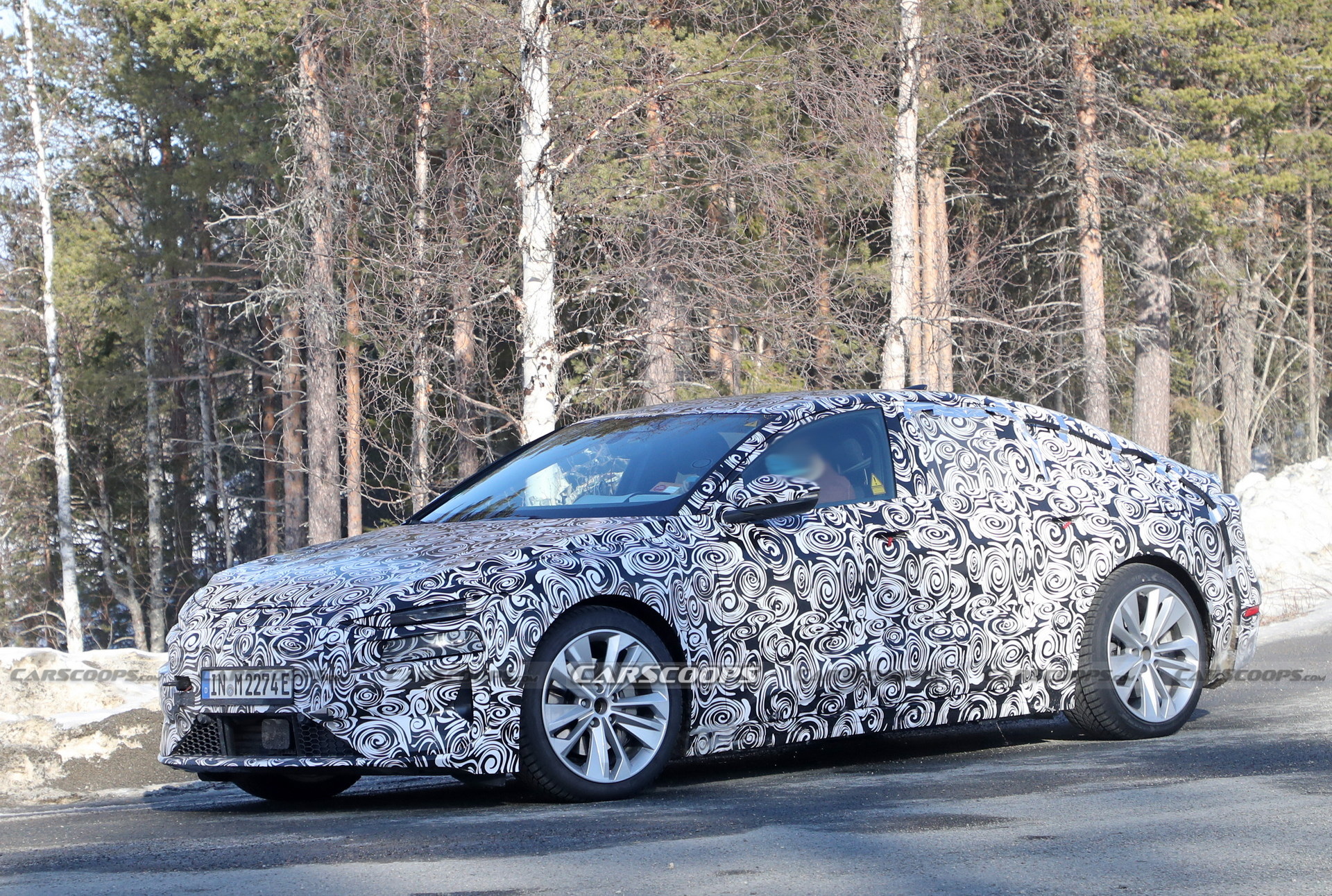 2024 Audi A6 E-Tron Spied Again Showing Split Headlights And Toned-Down Styling