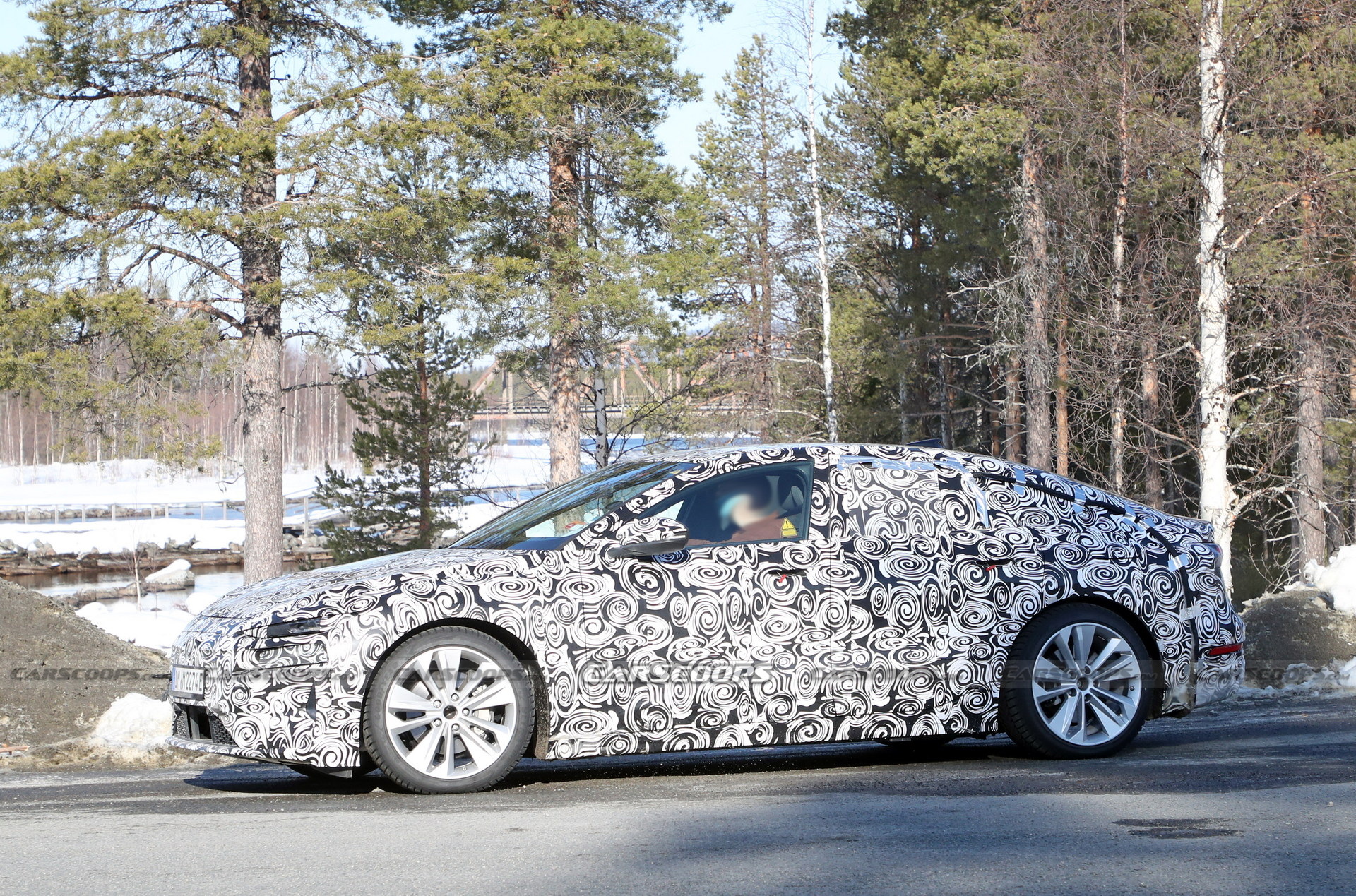 2024 Audi A6 E-Tron Spied Again Showing Split Headlights And Toned-Down Styling