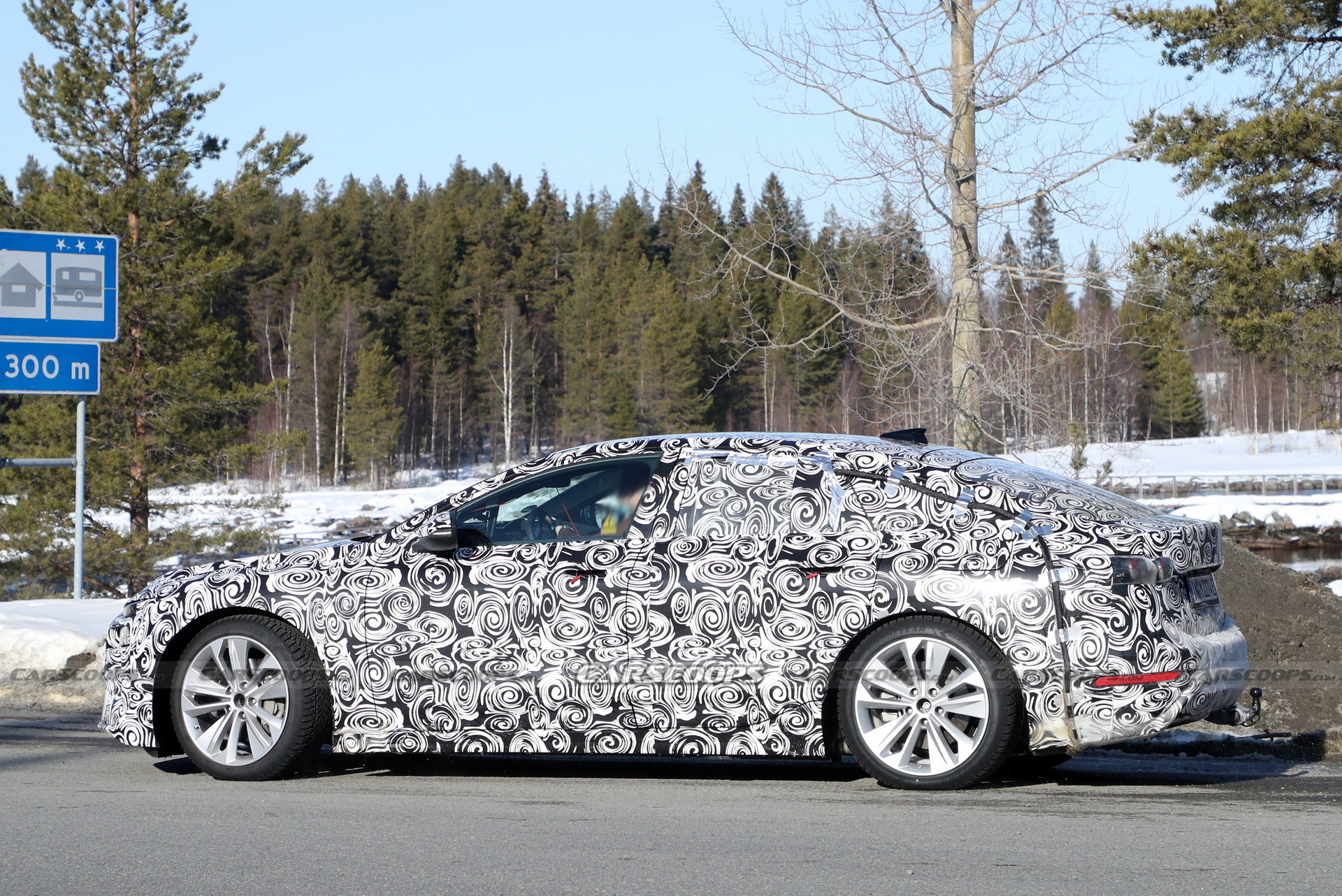 2024 Audi A6 E-Tron Spied Again Showing Split Headlights And Toned-Down Styling