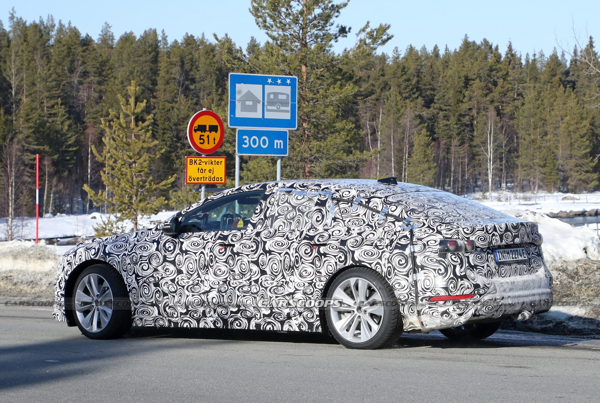 2024 Audi A6 E-Tron Spied Again Showing Split Headlights And Toned-Down Styling