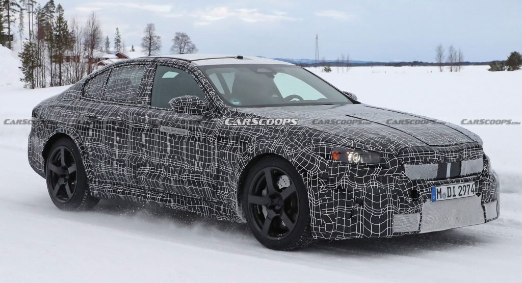  2024 BMW M5 Will Embrace Electrification, Prototype Spotted Wearing Hybrid Badges